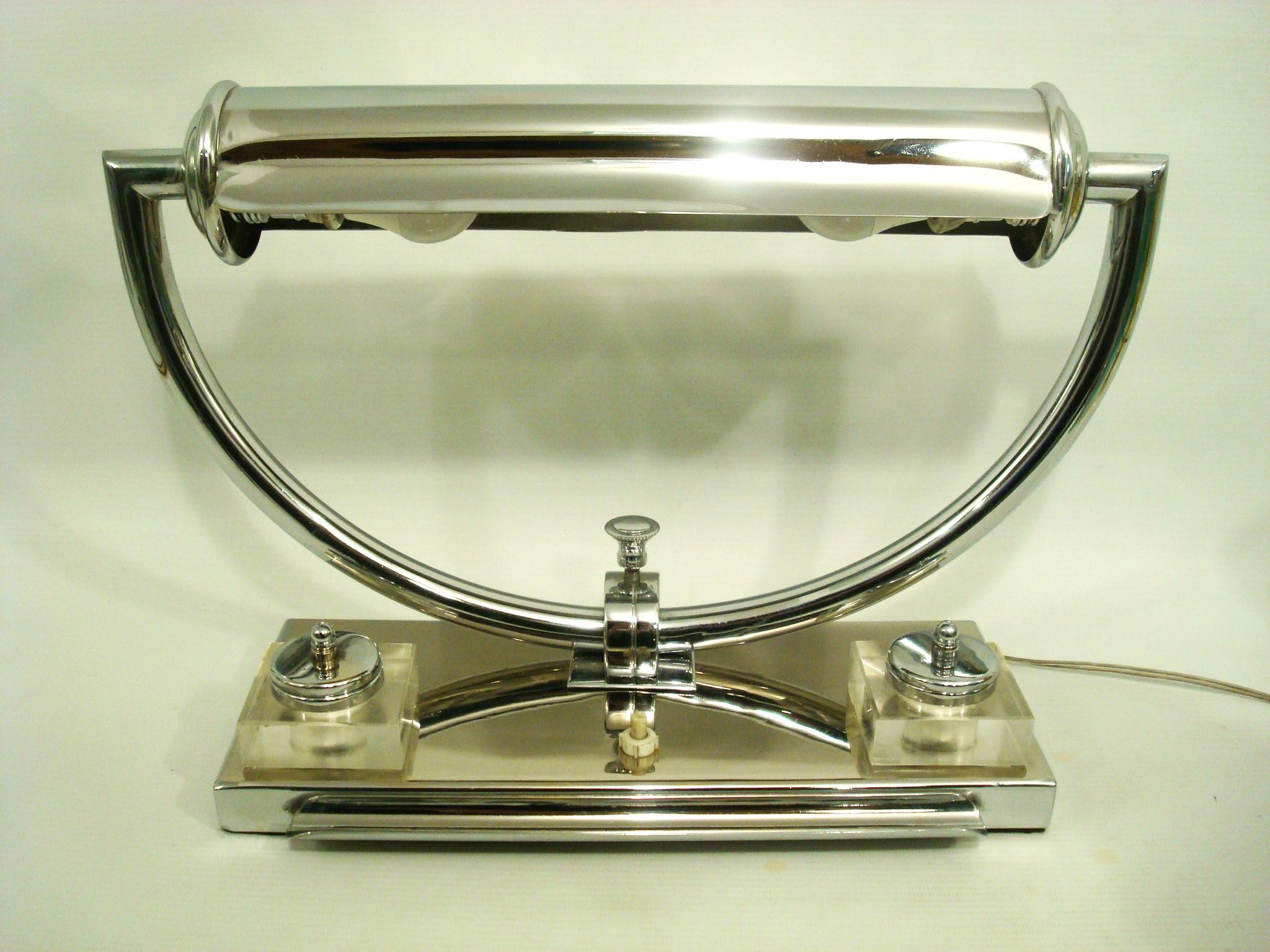 Art Deco Modernist Desk and Table Lamp. USA 1930´s

Art Deco Modernist Desk and Table Lamp. Restored with many useful features. The lamp is fully adjustable moving forward and back, designed to be used with two bulbs for even illumination. LEDs are