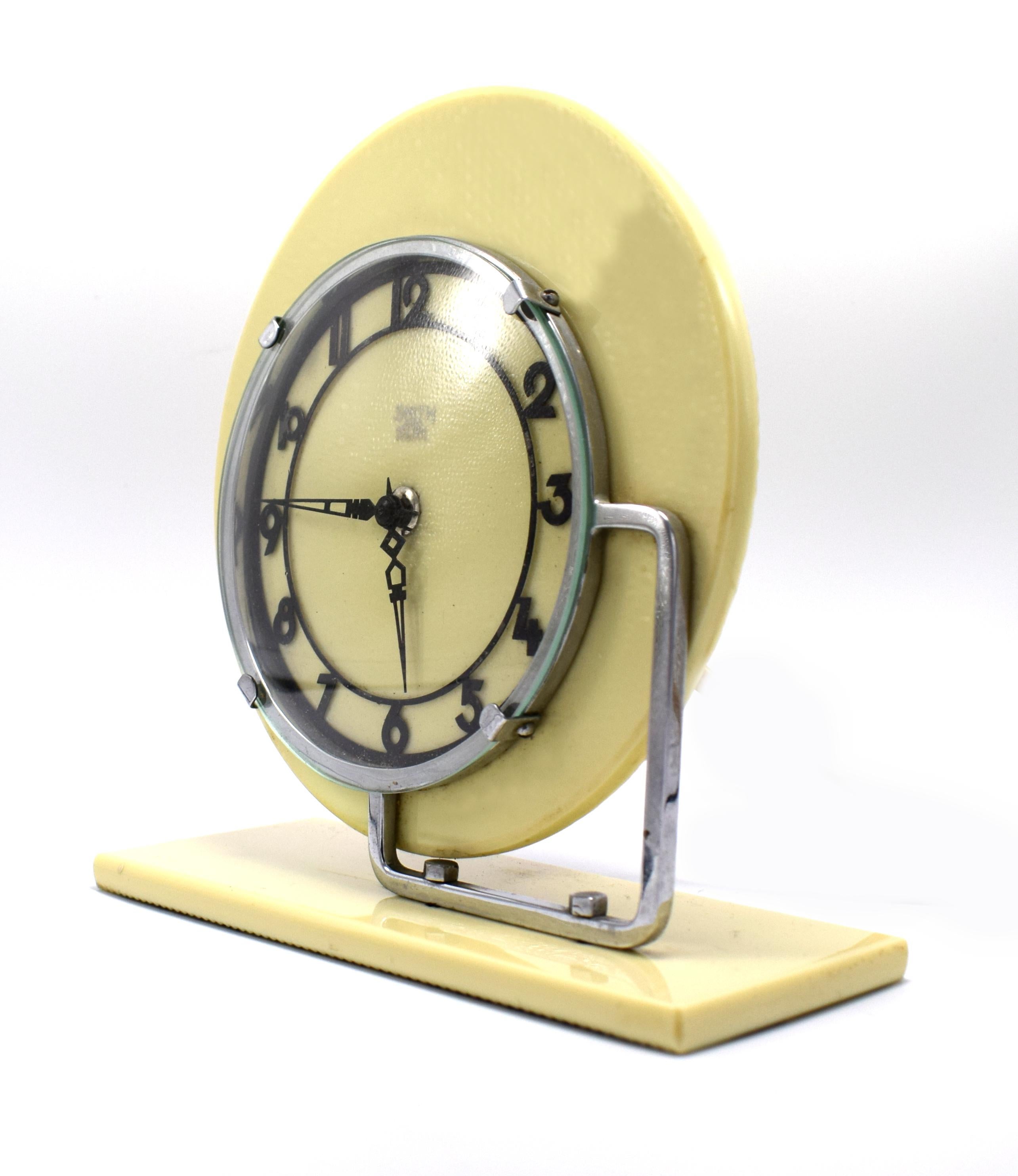 Quite a rare model, only had this clock once before in the last couple of years. Modernist 1930s Art Deco Clock by English makers GEC, runs on electric, so plug in and go! Pale yellow vitrolite (compressed glass) with chrome bezel and black enameled