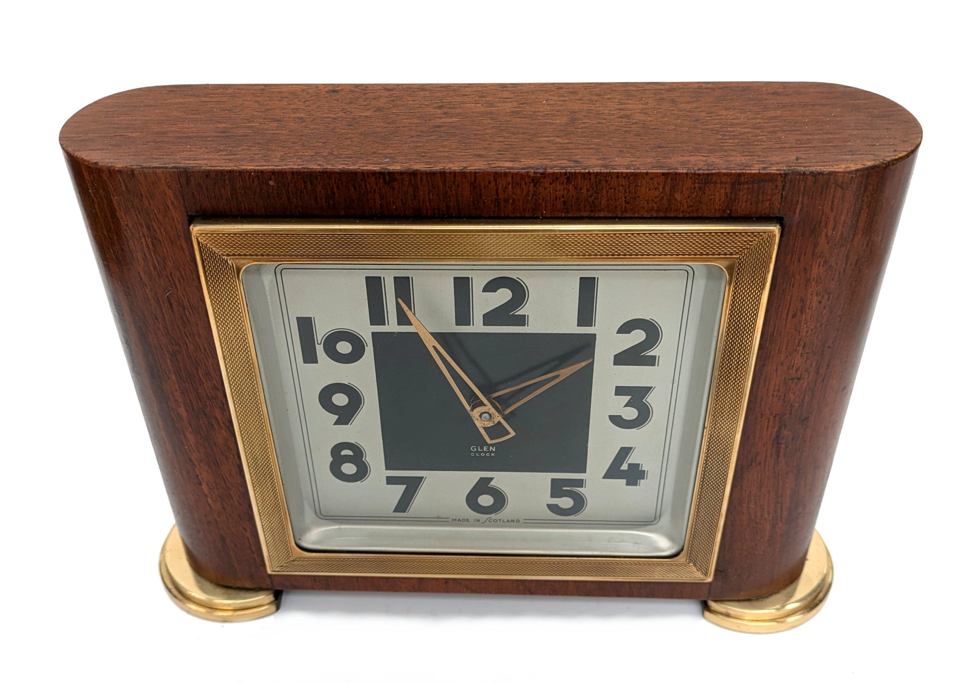 For your consideration is this very stylish 1930's Art Deco good sized mantle clock made by clockmakers 'glen'. Mahogany case with brass engine turned bezel , this clock really does make a statement . The movement is 8 days . Recently fully serviced