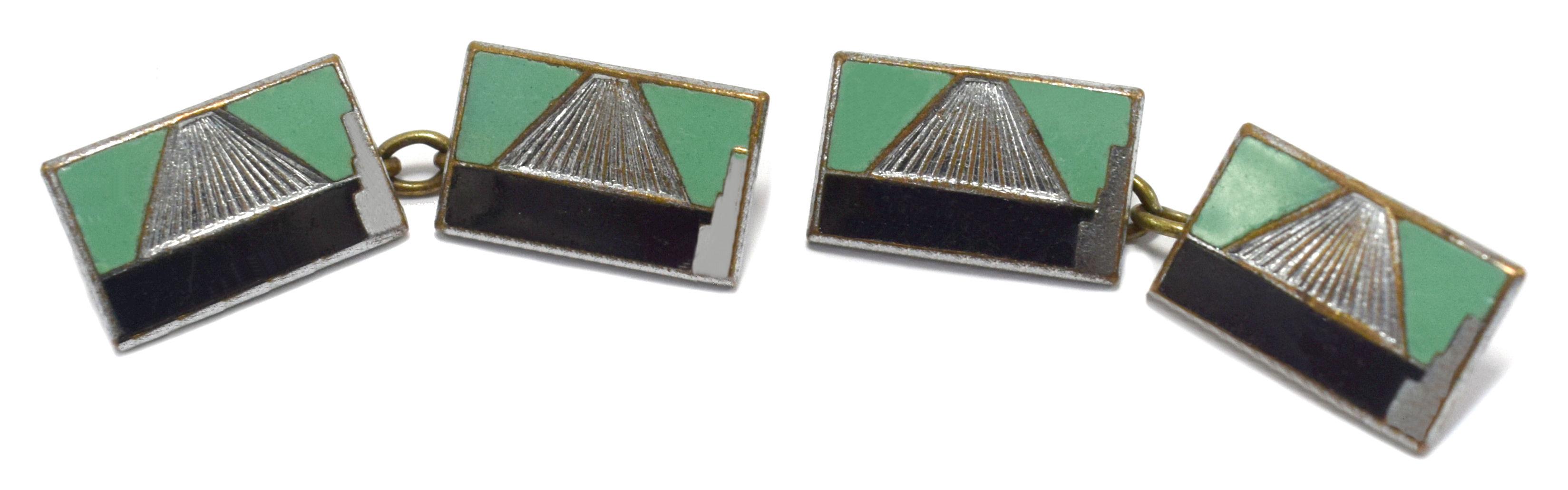 Extremely stylish and totally original are these matching pair of English Art Deco modernist enamel cufflinks dating to the 1930's. Fabulous geometric patterning and colour, with a slight modernist feel. Certainly can't be confused with any other