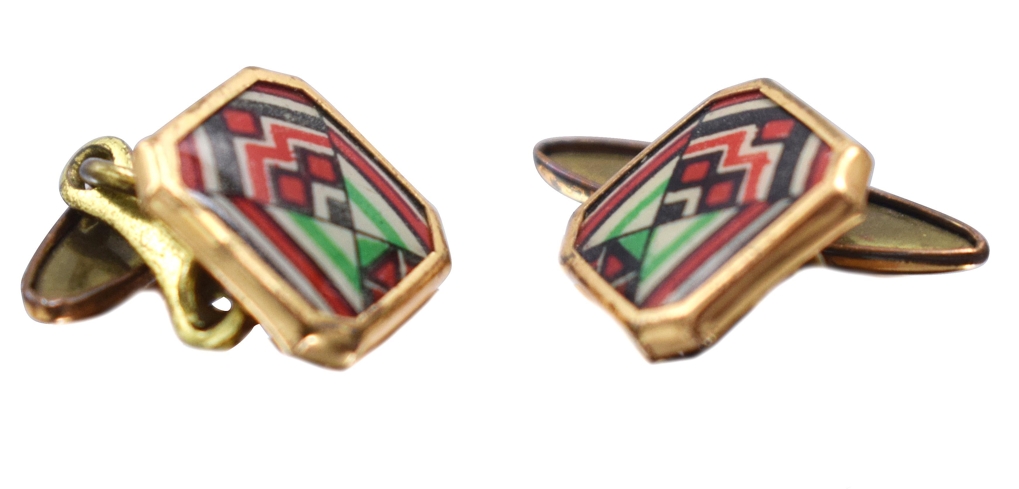 A rare find are these extremely stylish matching pair of English 1930's Art Deco modernist enamel gents cufflinks. Fabulous geometric patterning and colour, such a distinctive look. Condition is very good with only signs of age to the under link
