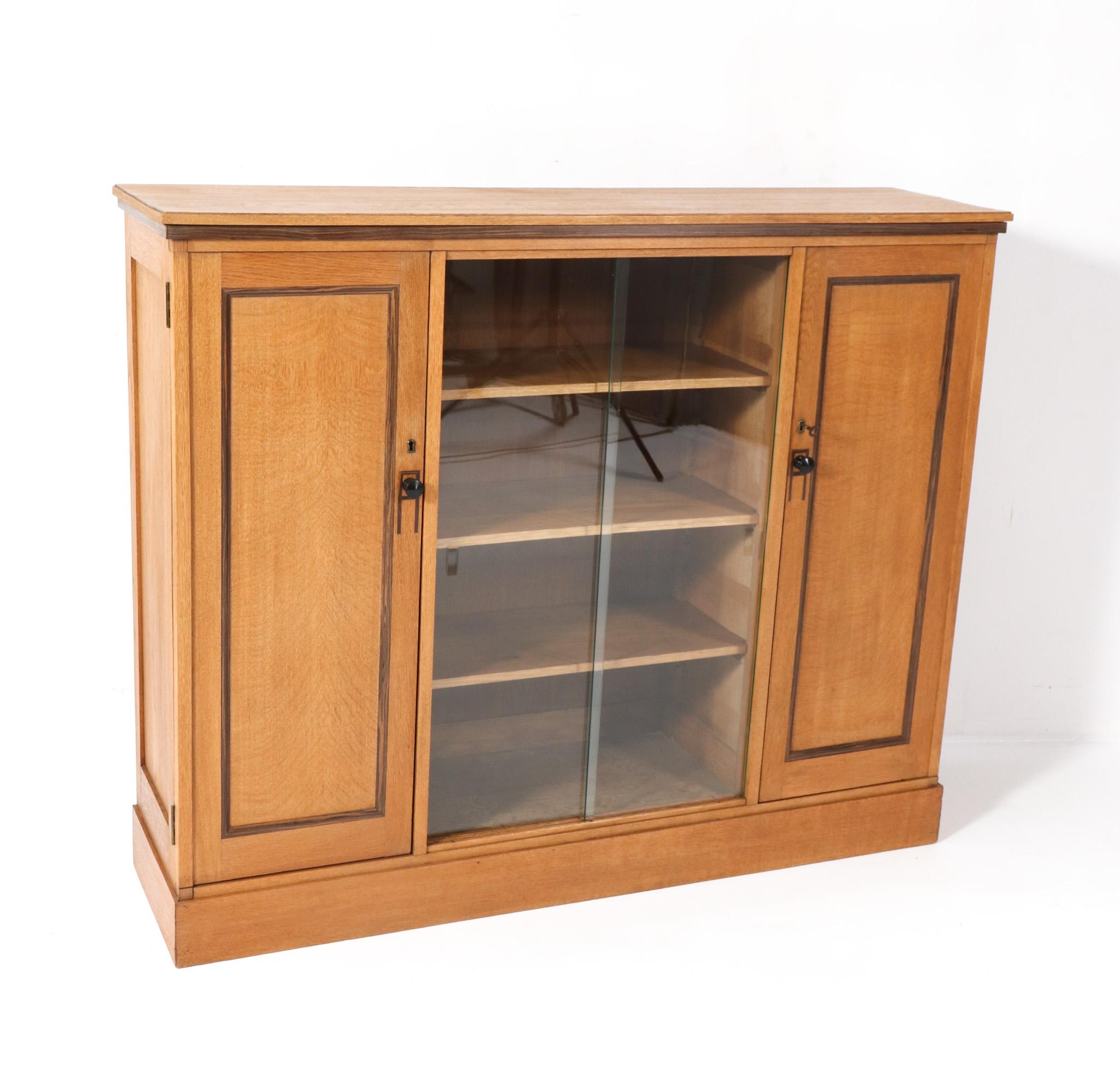 Dutch Art Deco Modernist Oak Bookcase with Glass Sliding Doors, 1920s For Sale