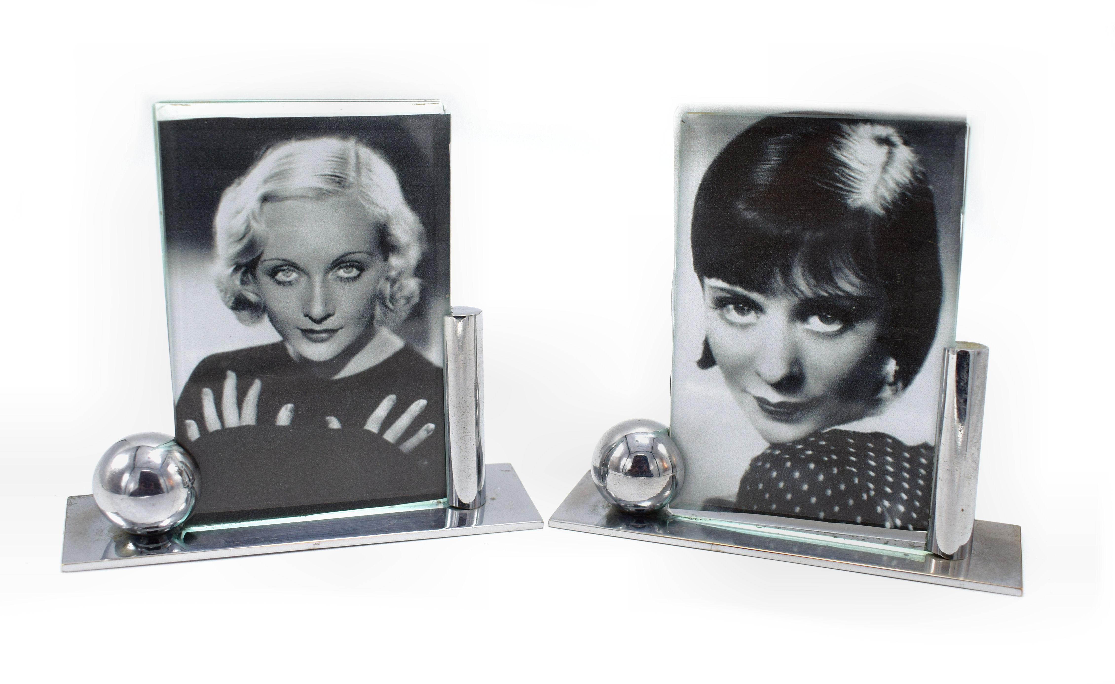 Super stylish matching pair of 1930s Art Deco Modernist pictures in chrome and glass. The frames have two pieces of glass which slot into the chrome stands and are beveled both sides. Ideal size and perfect for any setting. Originates from France