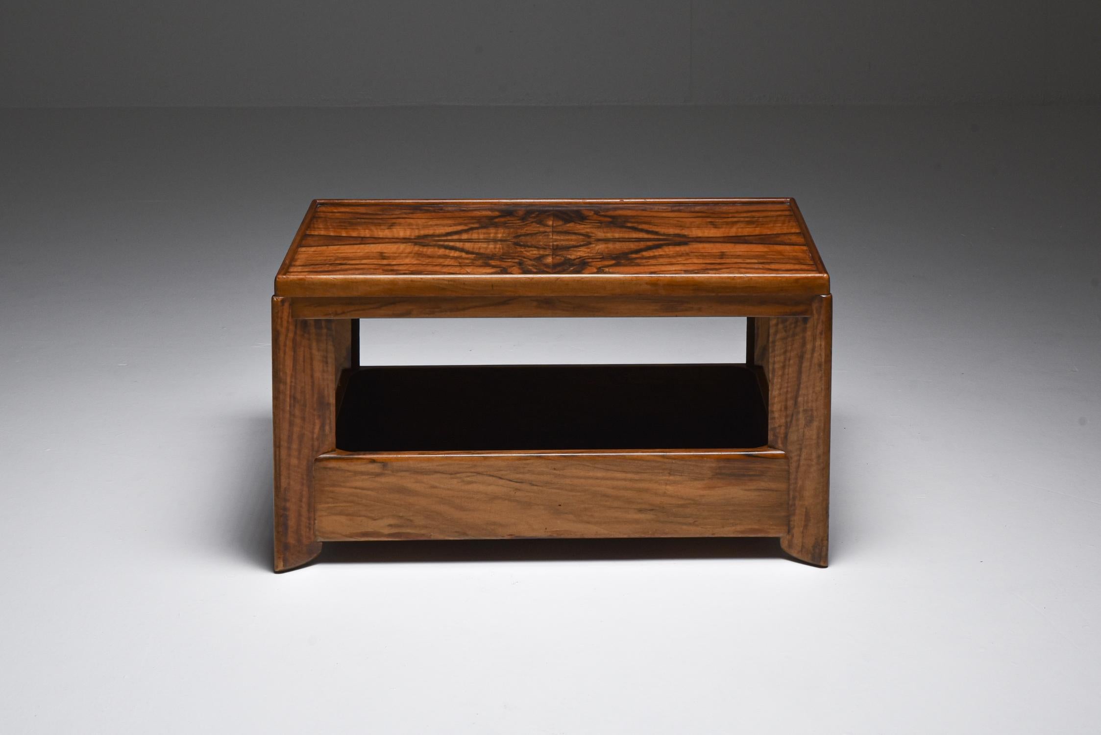 Rosewood coffee table, H. Wouda, 1930s The Netherlands

Solid rosewood coffee table from Dutch Hague School designer Hendrik Wouda
This piece is quite exuberant in the use of material, the top part of the table showing the beautiful grain of the