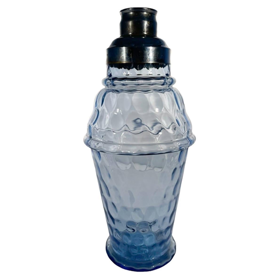 Shaker da cocktail in vetro blu modellato in stile Art Deco con motivo di impronte di pollice su tutta la superficie