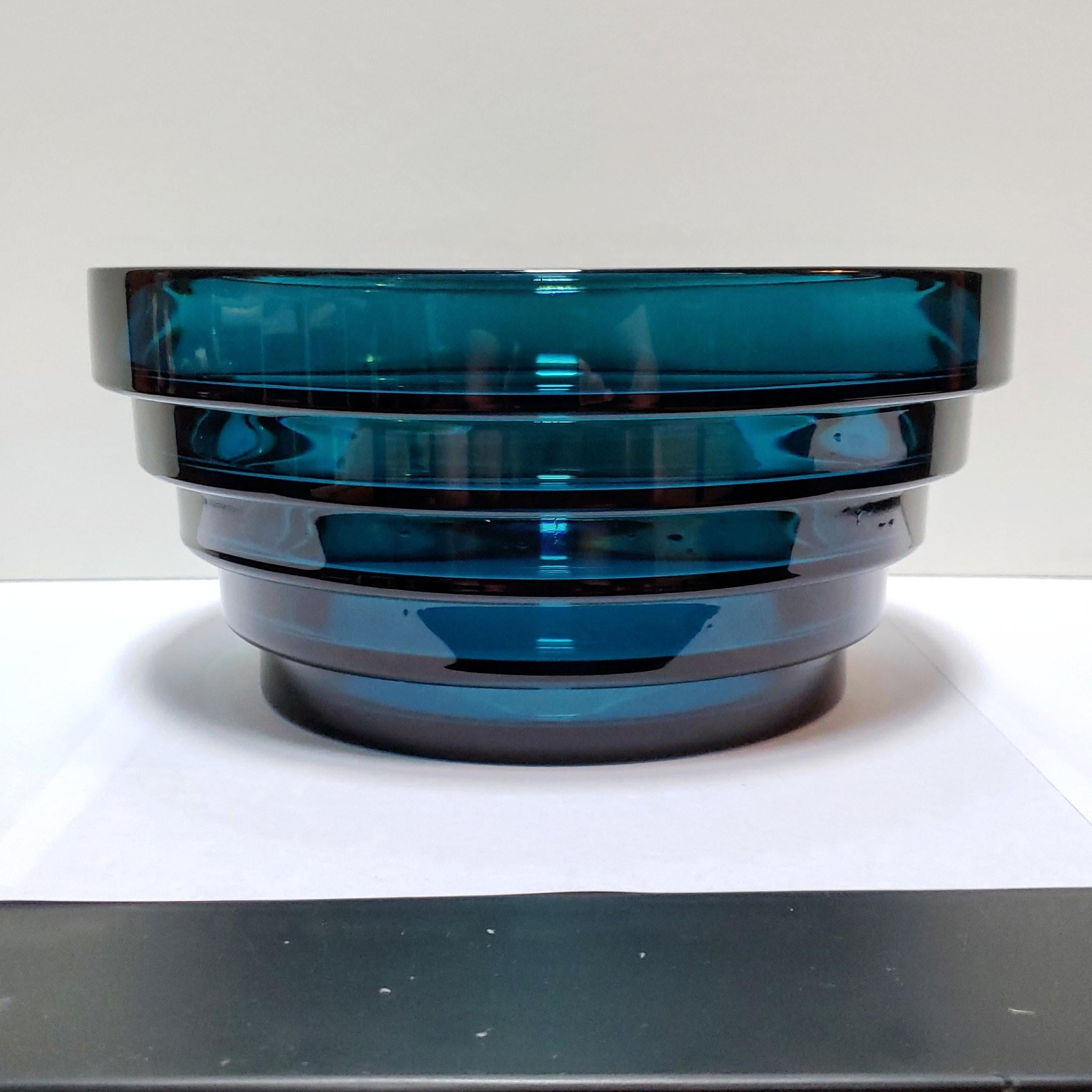 Blue-green French Art Deco molded crystal center or fruit sky-scraper bowl in heavy crystal, circa 1930. 
Shipping quote is for lower 48 states only and includes pro pack, shipping and insurance.