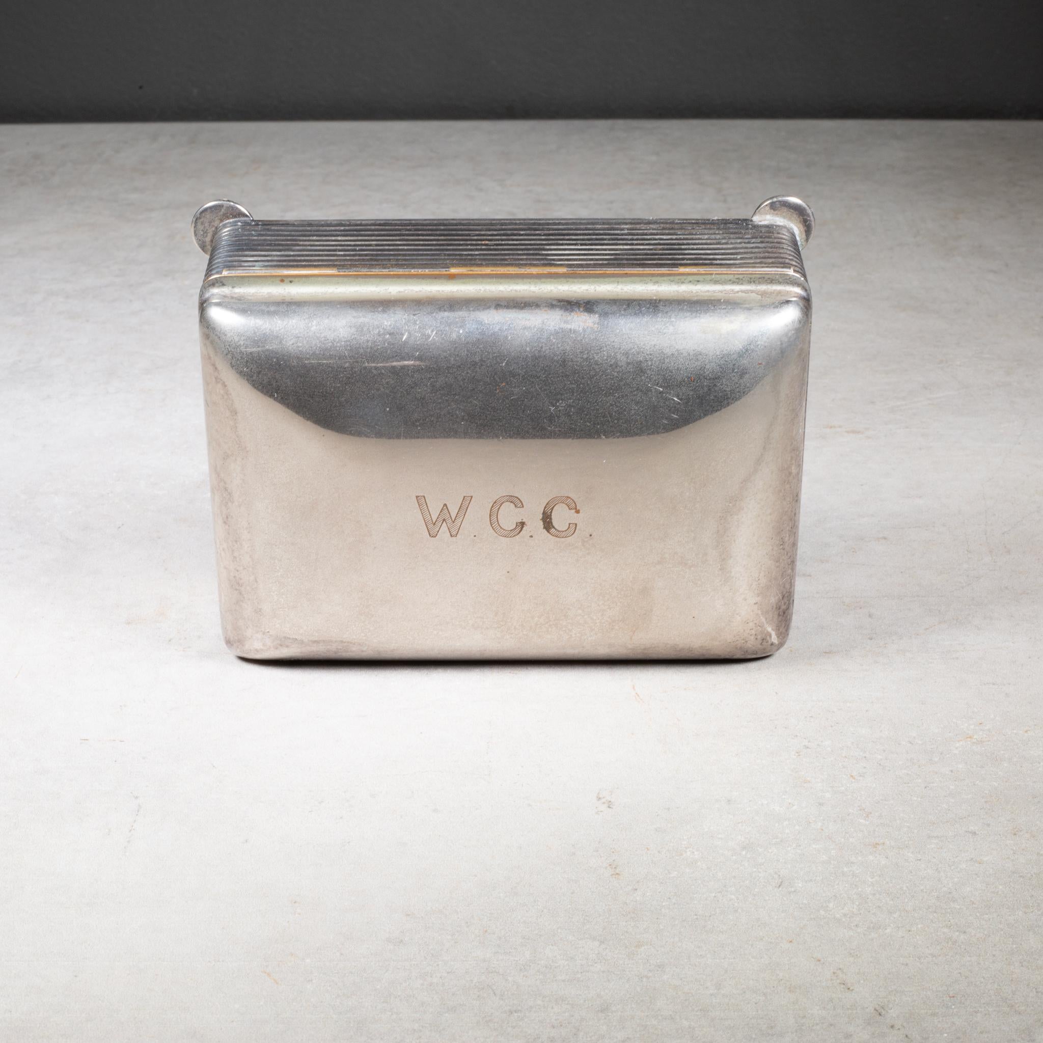 ABOUT

An original Art Deco silver plated cigarette box monogrammed 