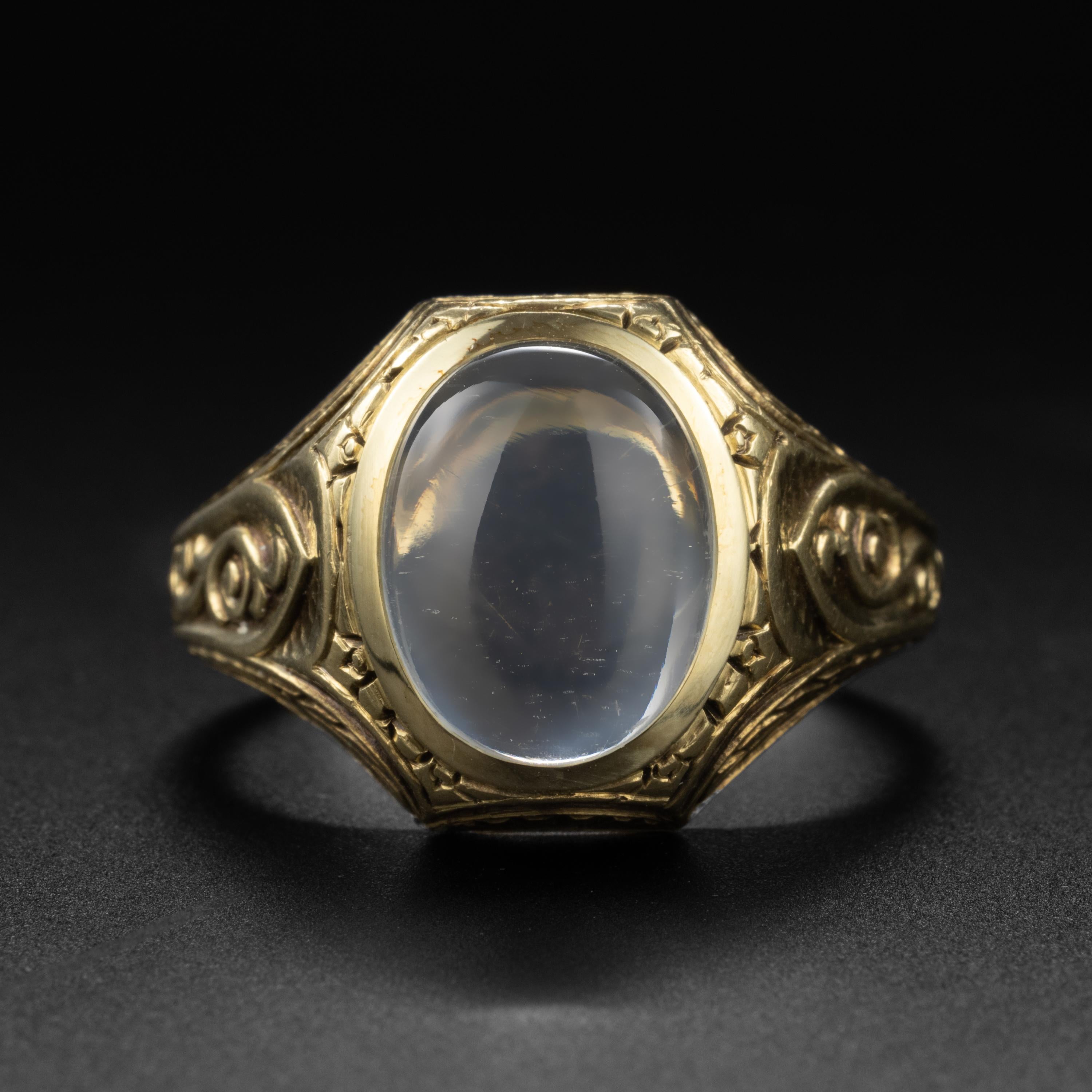 Created by the iconic firm, Allsopp Bros in or around 1925, this 14K yellow gold ring has been deeply engraved with the masculine desicn elements of the day: laurel branches, architectural arches, and on the shoulders, a motif of swirls, possibly