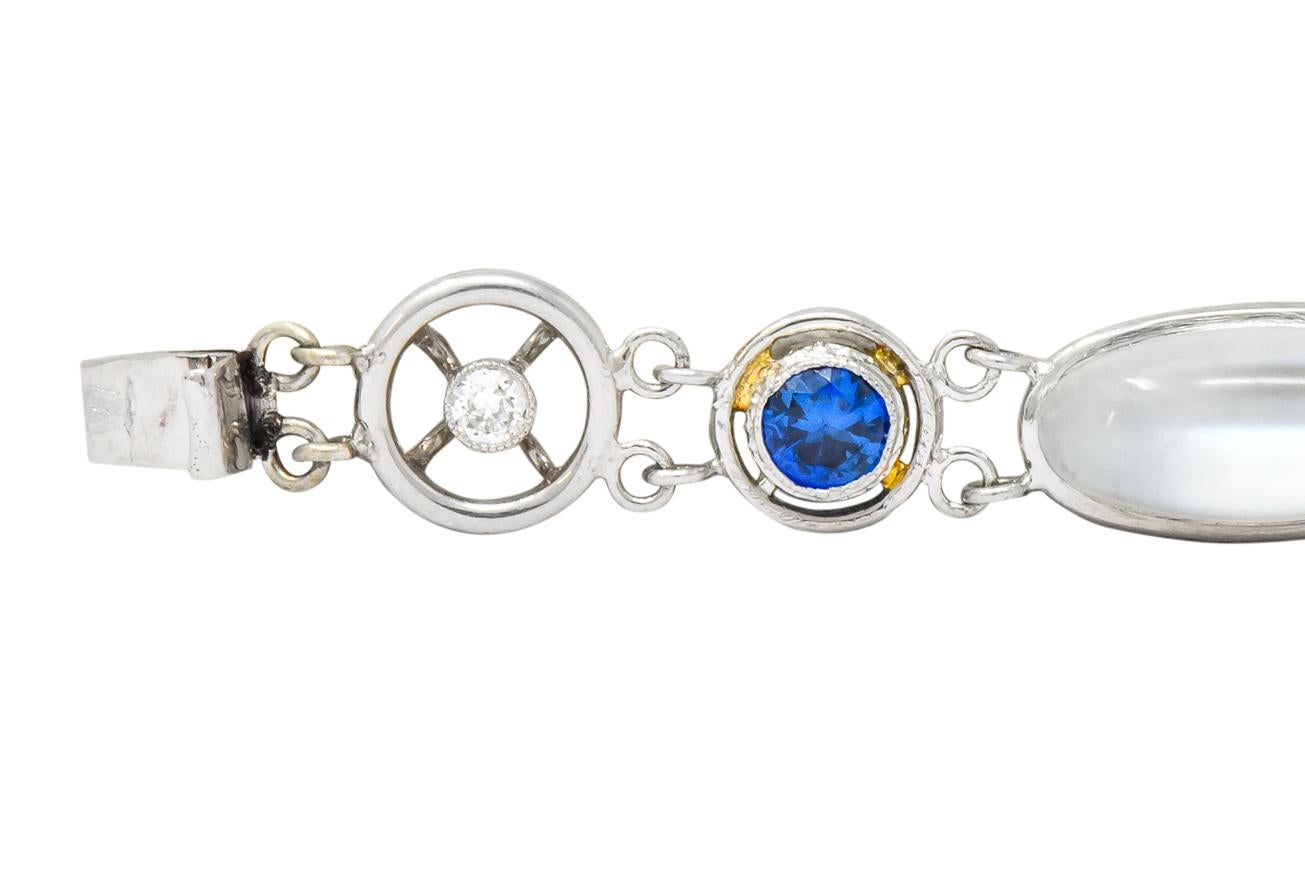 Designed as link style bracelet with pierced round, oval, and pear shaped links in iconic Art Deco design

Larger links are bezel set with round and oval cabochon cut moonstones varying in size, semi-transparent with subtle white adularescence

With