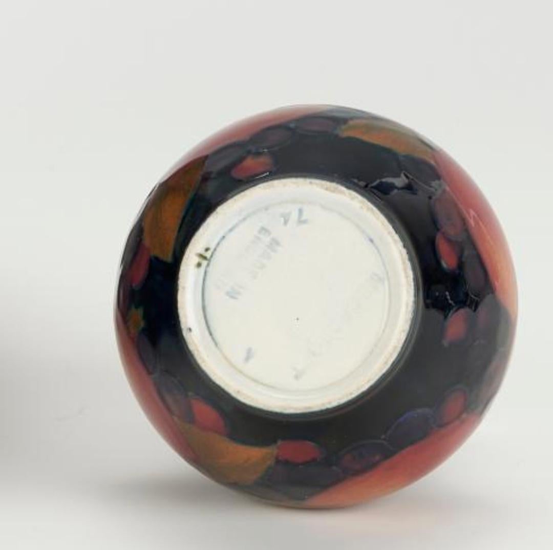 Art Deco Art deco Moorcroft POMEGRANATE small vase with silver plated rim.