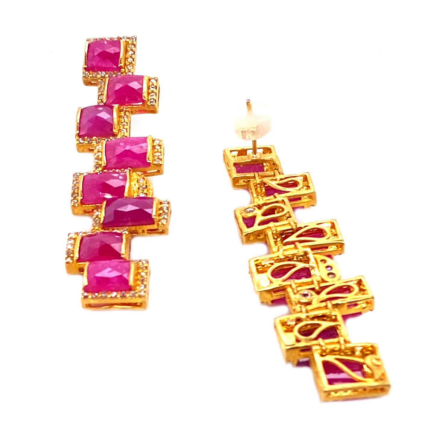 Radiant and Bold statement earrings. Set in a beautiful rich 20 Karat Yellow Gold. And Ruby weighing approximately 16.34 carats and Diamonds at 1.37 carats. These kind earrings have been brought to you by the Luminosity collection, which consists of