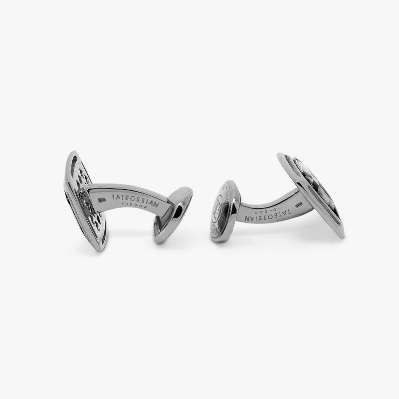 Art Deco Mosaic Cufflinks with Mother of Pearl and Onyx in Sterling Silver

White mother of pearl and black onyx come together in a harmonious blend of semi-precious stones, to create a minimalistic mosaic. Featuring a cut-out square frame set in