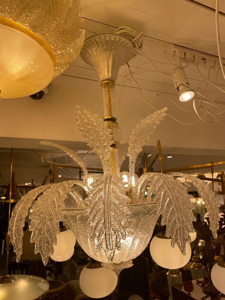 Elegant hand blown Murano glass chandelier by Ercole Barovier.
Excellent vintage condition.
Six E 27 light bulbs.