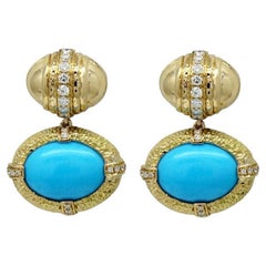 Orecchini Art Deco con turchese americano naturale e diamanti in oro giallo 18 carati