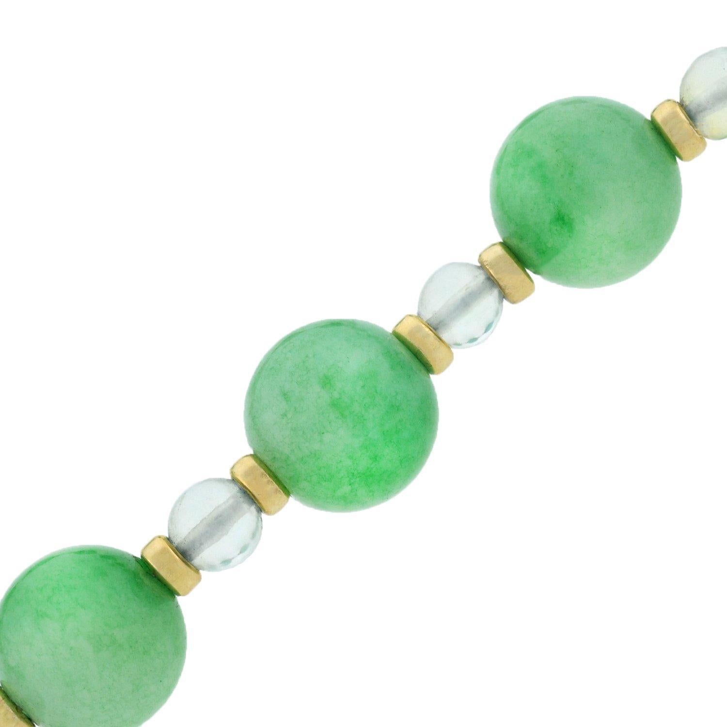 A gorgeous jade and moonstone bead necklace from the Art Deco (ca1920) era! This stunning and relatively long piece is comprised of an alternating pattern of incredible natural jade and moonstone beads. The similarly sized jade beads display