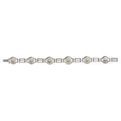 Bracciale Art Deco con perle naturali, diamanti e platino, circa 1930