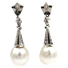 Antique Art Deco Natural Pearl Onyx Diamond 18K White Gold Earrings circa 1920