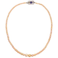 Vintage Art Deco Natural Pink Pearl Necklace with Diamond and Sapphire Clasp, circa 1930