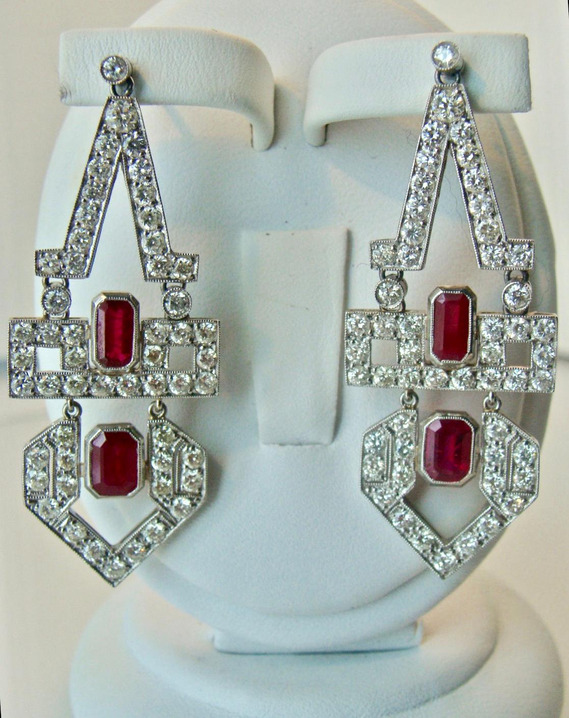 Spectacular Art Deco Style 8.0 Carats Natural Ruby Diamond Platinum Dangle Drop Earrings
Total Diamond Weight : Approx 4.00ct  VS-S1(106 Pave set Diamonds)
These Earrings feature 4 Genuine Emerald Cut Rubies
Total Ruby Weght : Approx