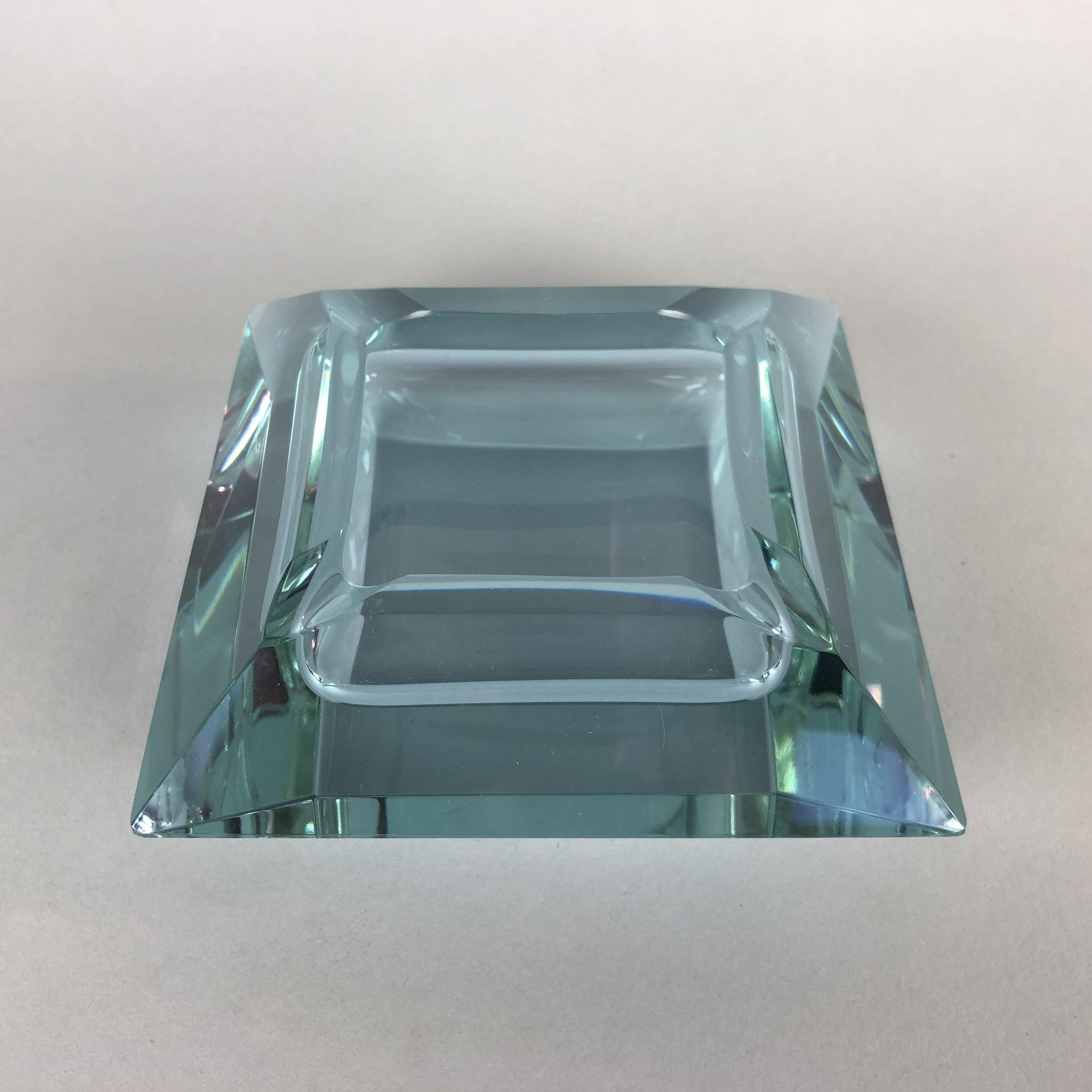 Art Deco ashtray made of neodymium glass (also known as Alexandrite glass). Beautifully shaped, changes colour depending on the light source.