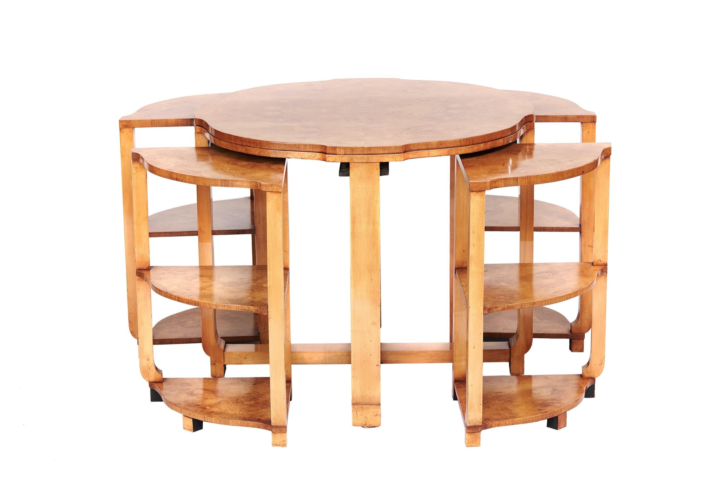 Fine Art Deco Nest 4 Tables with Burr Walnut Tops, circa 1920s
Shaped circular top with burr Walnut veneer, 
Nest 4 tables underneath, 
Each with 3 tiers & burr walnut tops, 
Slides under top to hold the 4 nests, 
Good quality tables, 
Recently