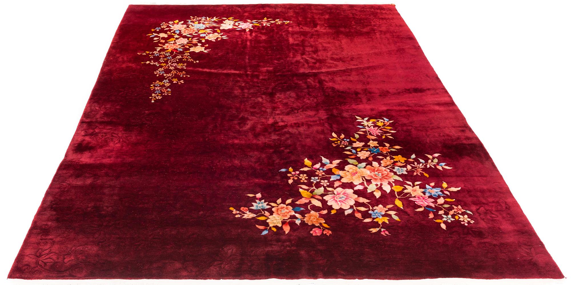 This Art Deco Nichols rug was woven in China in the first few decades of the 20th century. Rugs of this style began to usurp the more traditional Chinese designs during the 1910s and 20s. The result was some of the most iconic and eye-catching