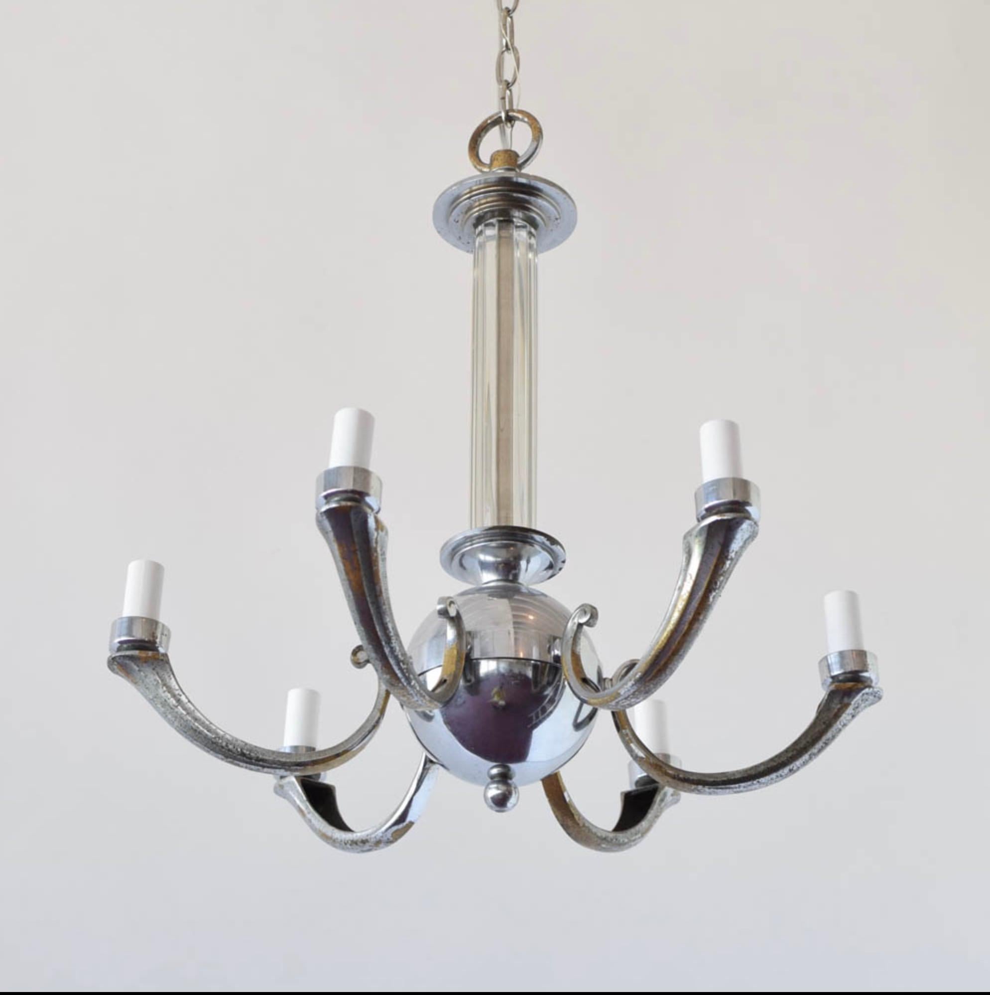 Vintage Art Deco Nickel 6 arm Chandelier. Re-wired and ready to be installed. 

Beautiful cylindrical nickel base with glass column rising from the base and scroll arm detail for each individual light. 