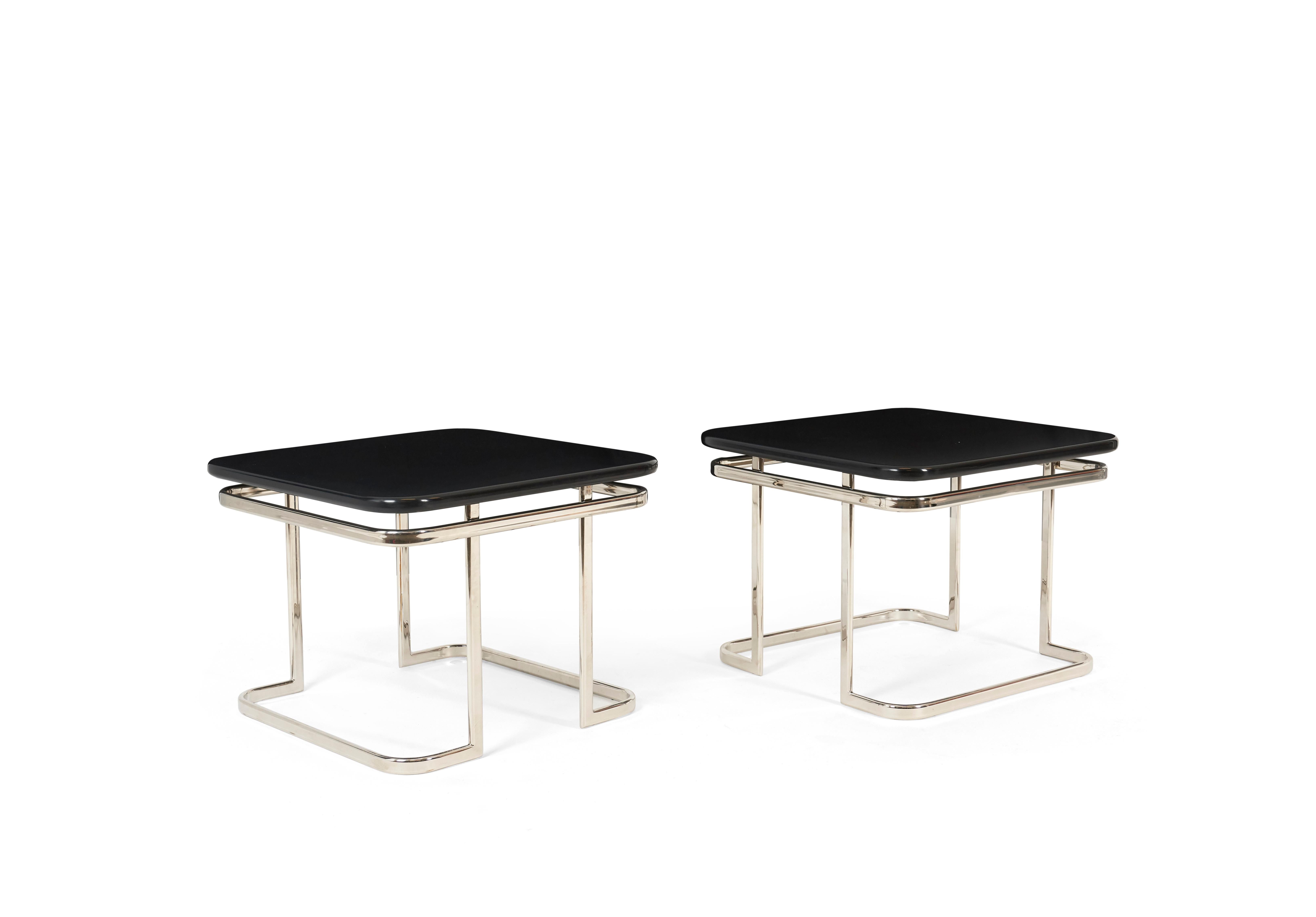 Beautiful Art Deco end tables Nickel frames with black lacquer tops.