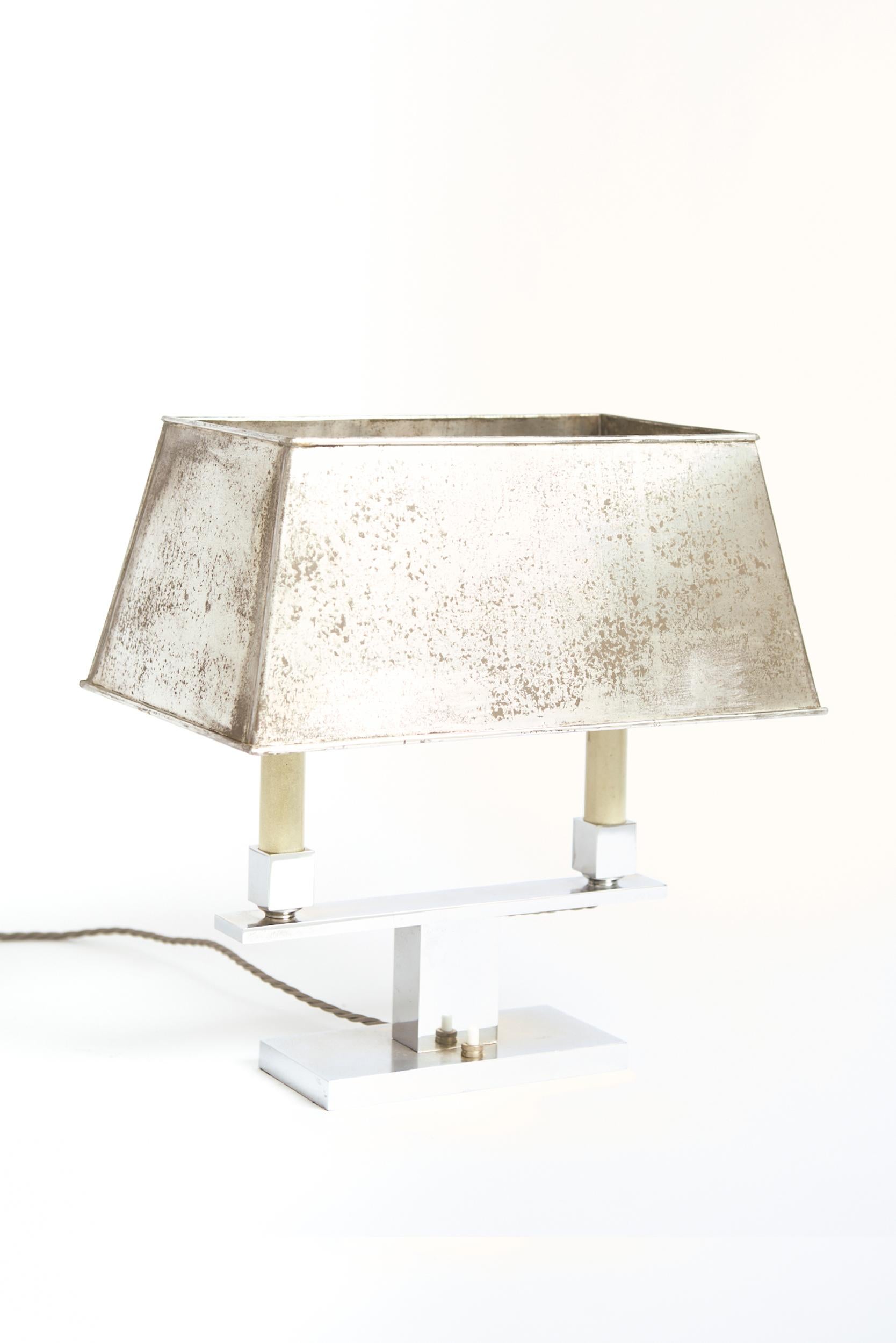 An Art Deco nickel plated brass table lamp
France, Circa 1930
