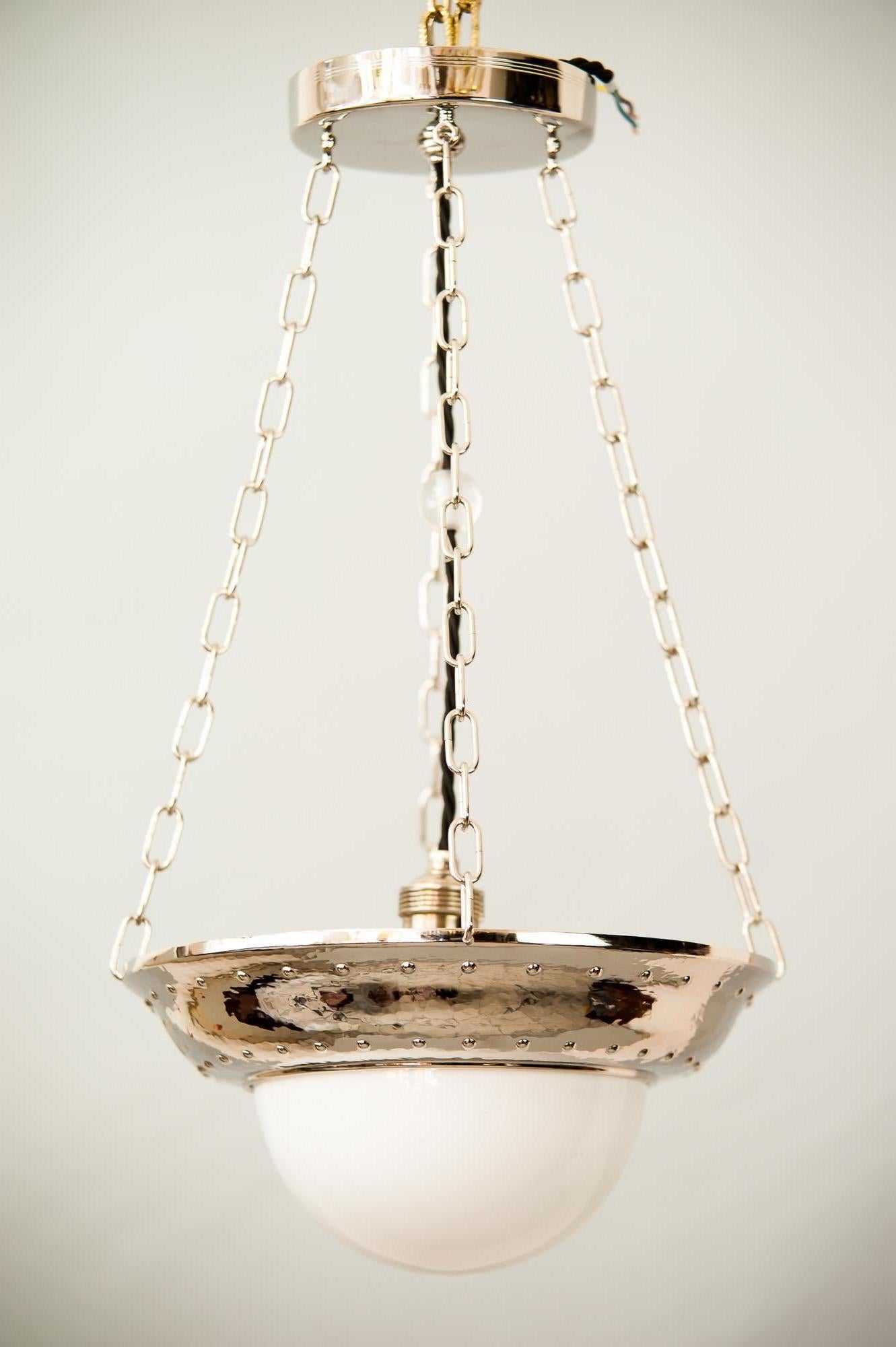 Art Deco nickel pendant with original glass, circa 1920s
Nickel-plated.