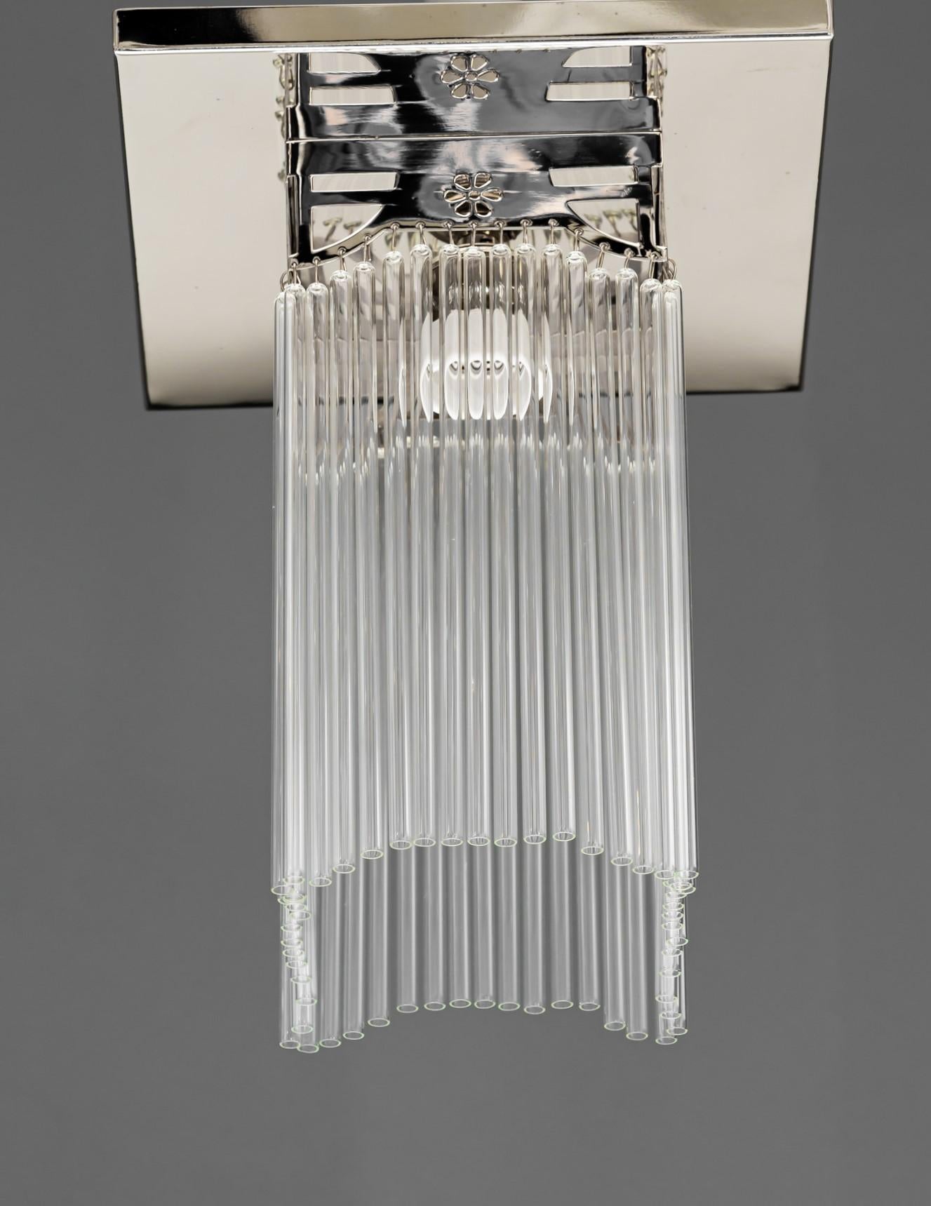 Art Deco nickel - plated ceiling lamp with glass sticks around 1920s.
Glass sticks are replaced (new).