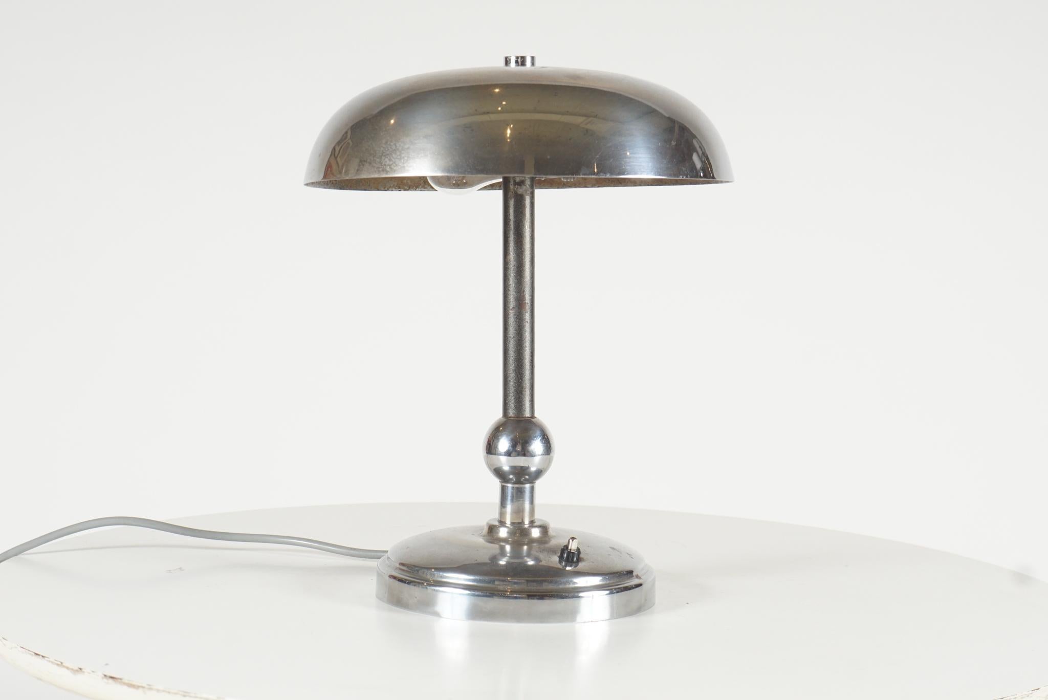 Diminutive table lamp from the early 1930s. Original shade and newly re-wired.