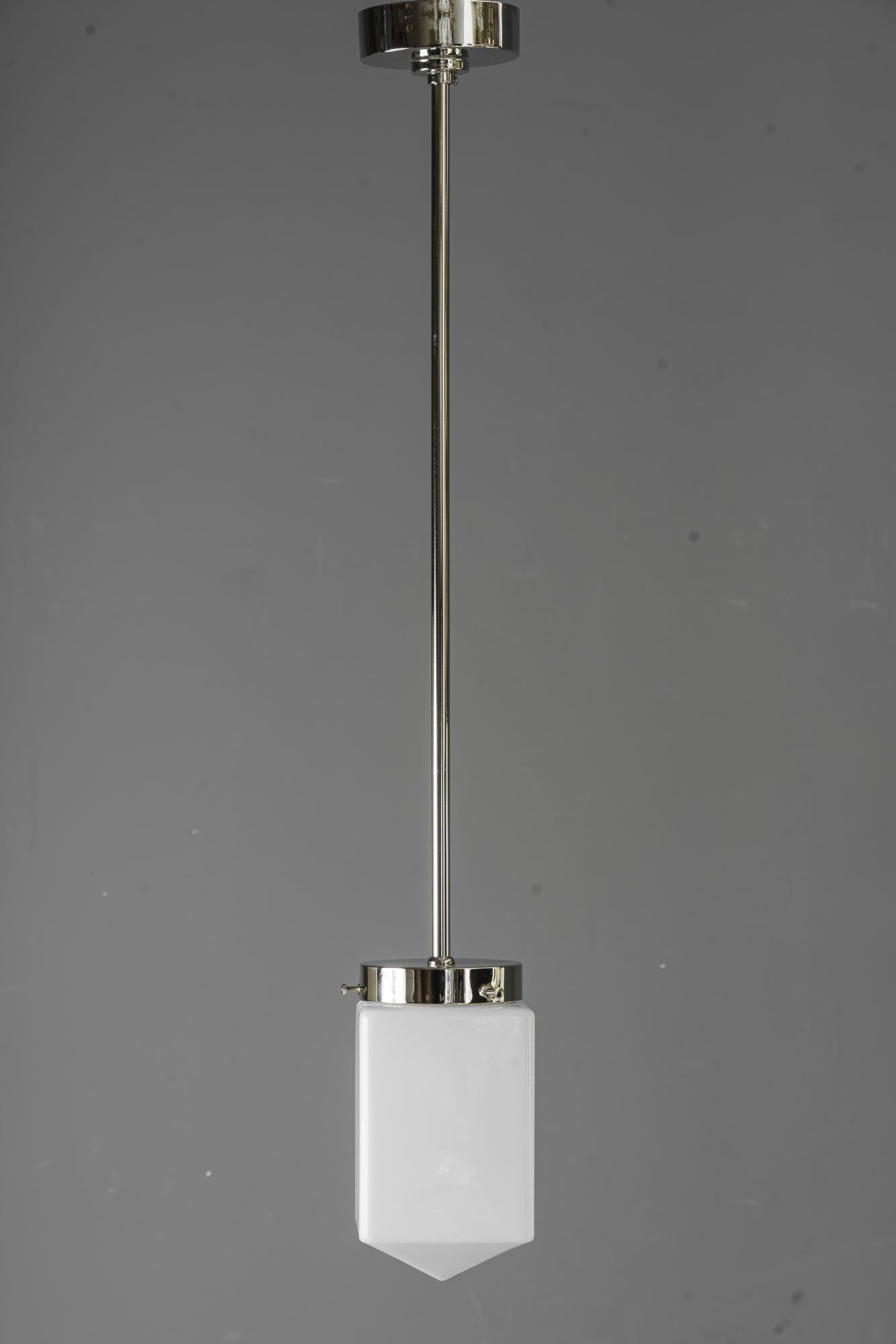 Art Deco nickel - plated pendant with opal glass shade vienna around 1920s.
 