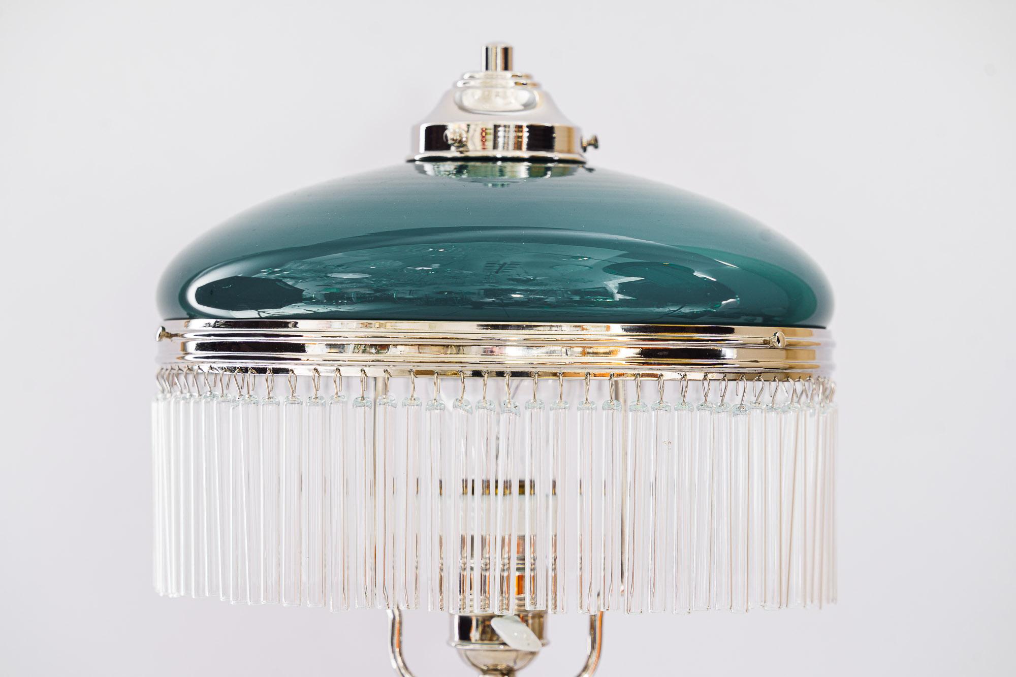 Art Deco nickel - plated table lamp vienna around 1920s.
The glass sticks are replaced (new).