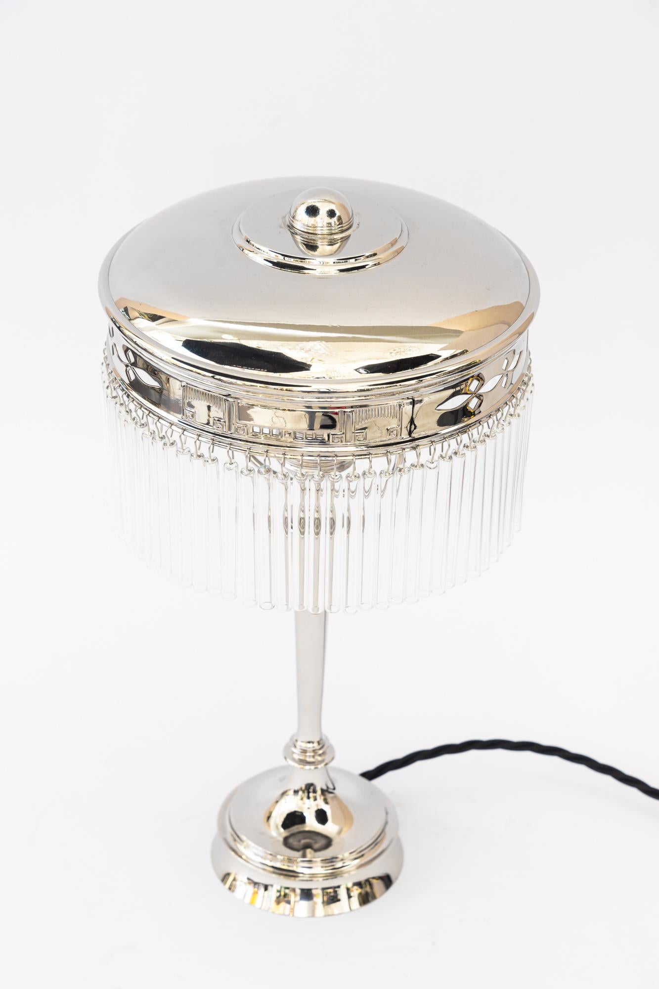 Art deco nickel - plated table lamp with glass sticks vienna around 1920s
The glass sticks are replaced ( new )