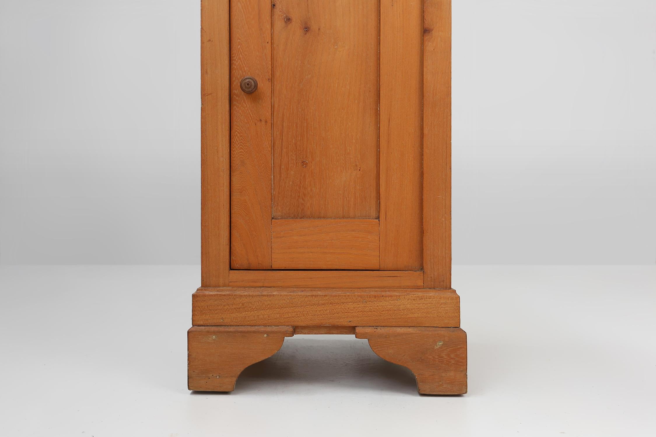 Carved Art Deco nightstand in pine wood, France ca. 1930 For Sale