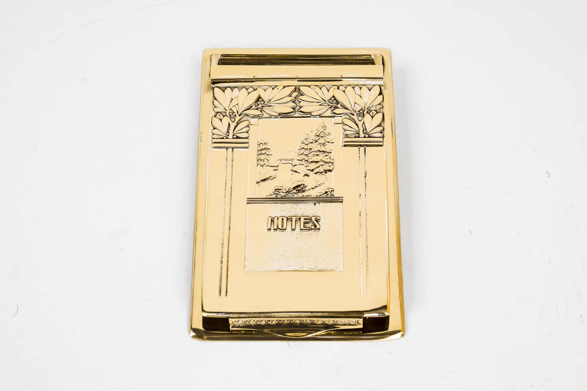 Art Deco note pad, Vienna, circa 1920
Brass polished and stove enamelled.