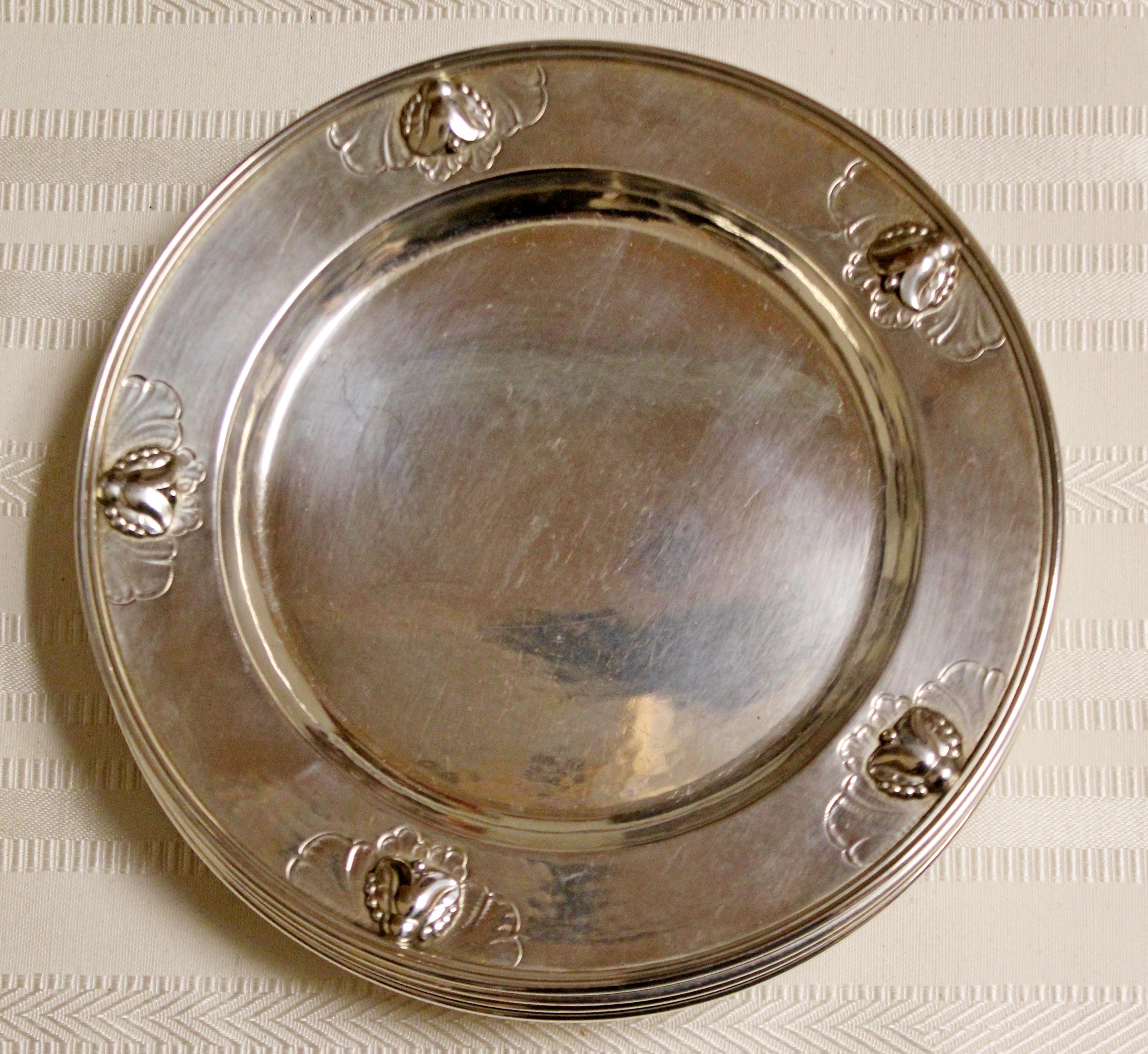 For your consideration is a spectacular, sterling silver, set of eight, blossom pattern, Georg Jensen plates, made in Denmark, circa 1940s. In excellent condition. The dimensions of each are 6