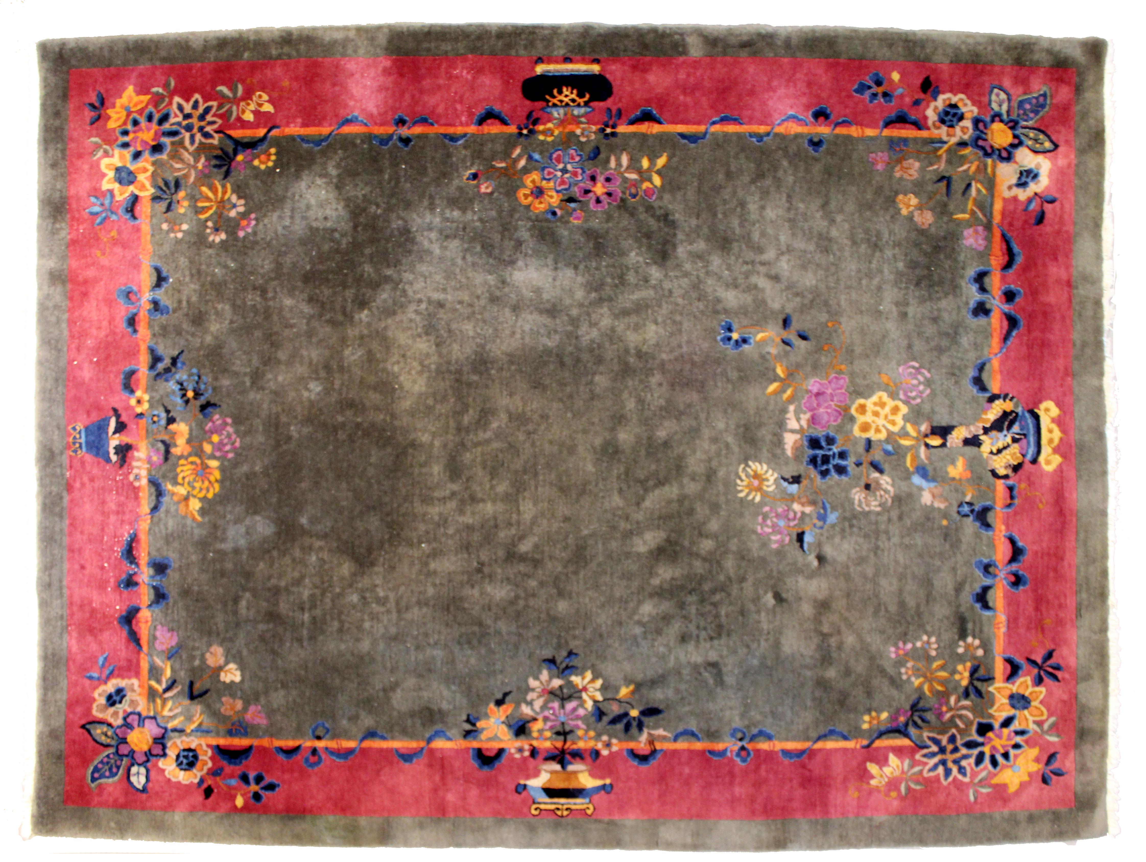 For your consideration is a gorgeous, rectangular, floral patterned area rug or carpet, by Nichols. In very good antique condition. The dimensions are 116