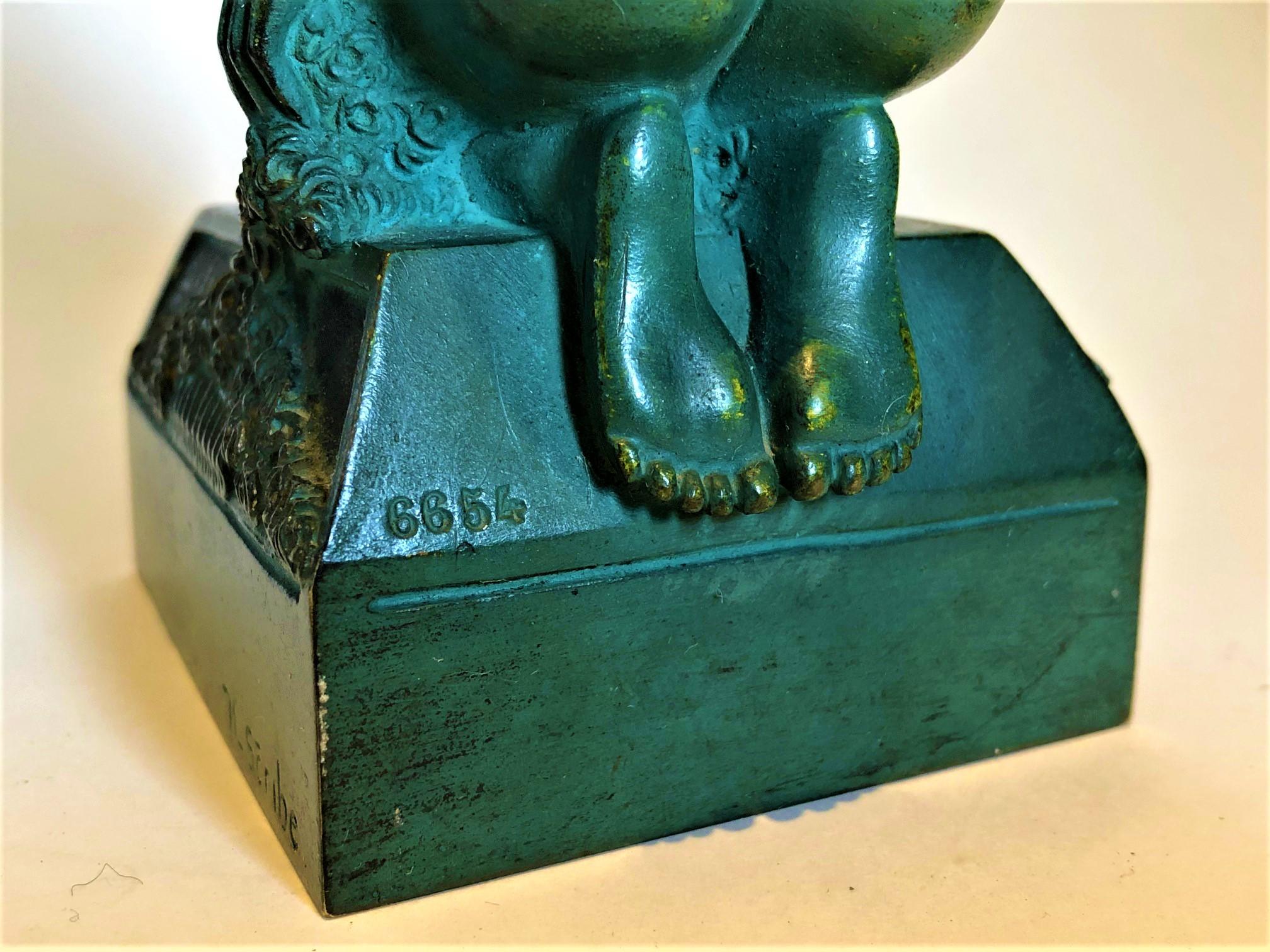 20ième siècle Serre-livres en bronze Art déco Femme nue érotique, c. France 1925, signé Scribe