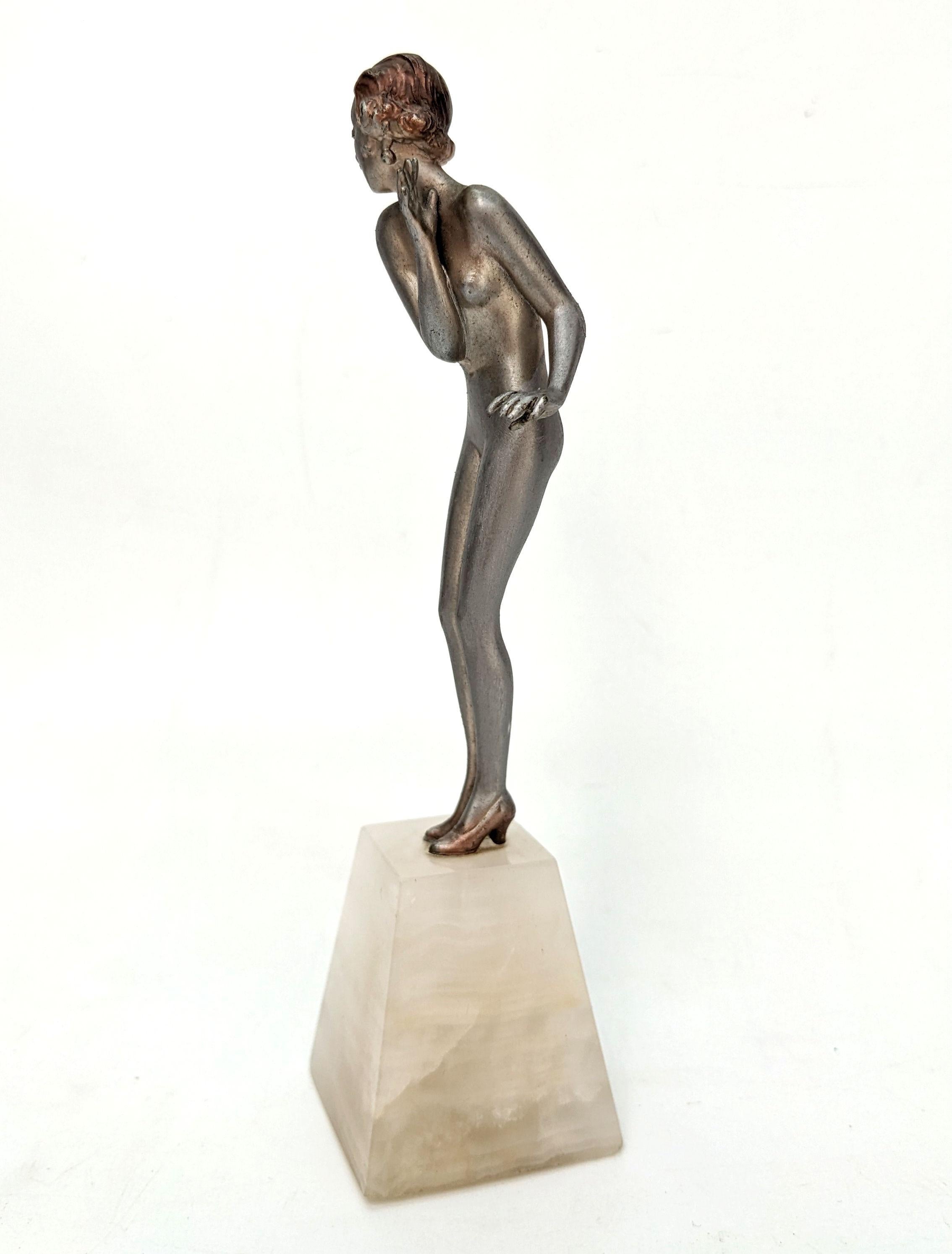 For your consideration is this delightful Art Deco figure depicting a nude young woman. Dating to the 1930's and stood on a Onyx base, although not signed we believe this figure to be by Josef Lorenzl. The detailing is lovely, from the crimped bob