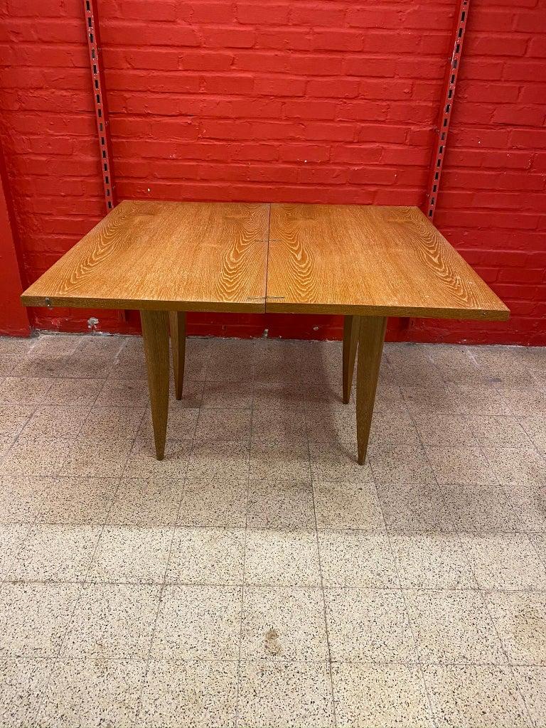 Art Deco oak console or table and table, circa 1930
Measures: 73 x 96 x 55 cm
or
70 x 110 x 96 cm

Some water spots on the closed tray.