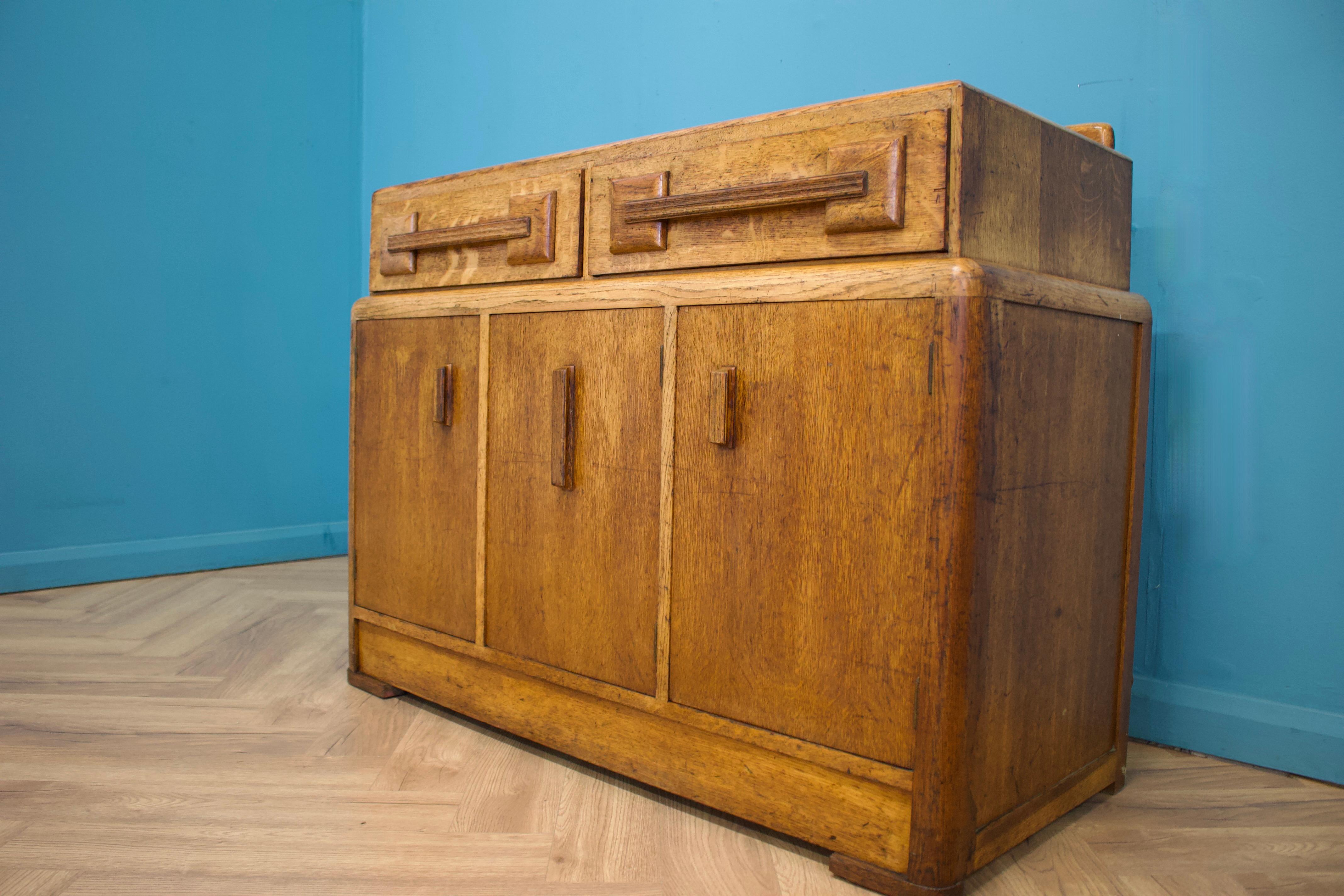 Mid-20th Century Art Deco Oak Sideboard G Plan Heals, 1930s For Sale