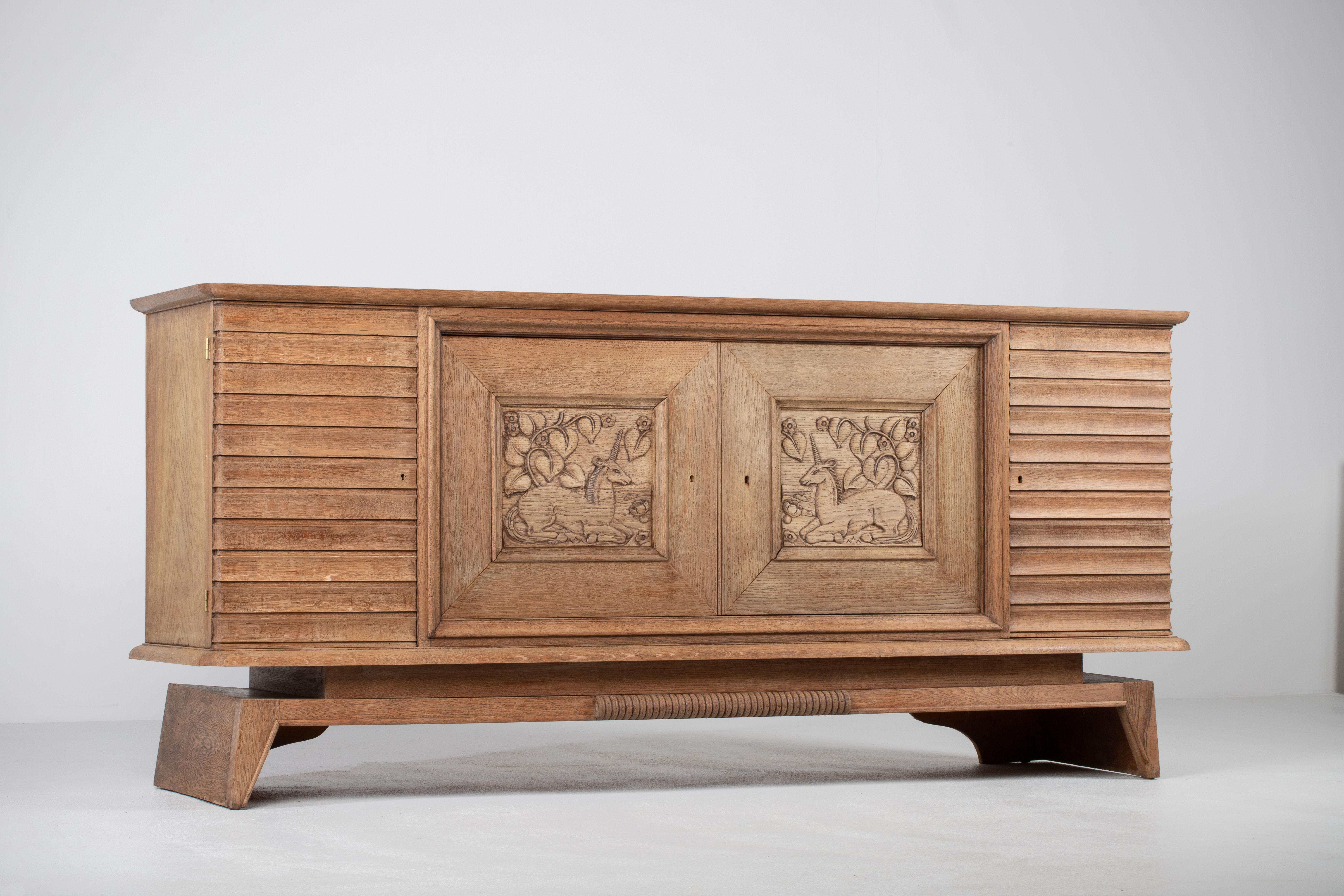 Art Deco Oak Sideboard with Carved Unicorn, France, 1940s 1