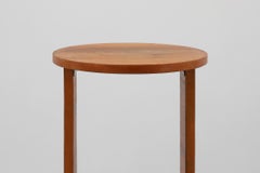 Art deco oak wooden round side table with bended leg, France 1920s