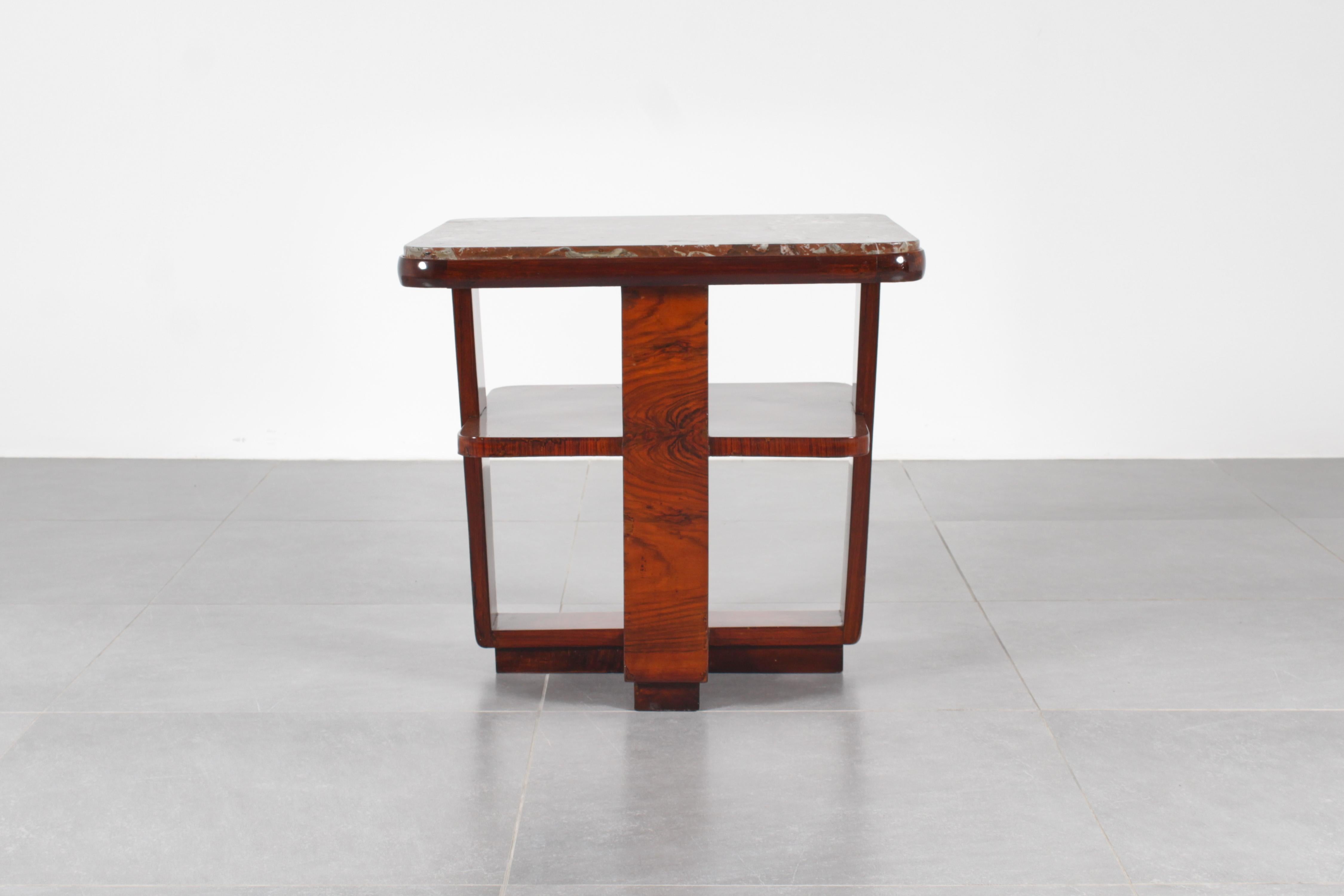 Rare and stylish coffee table restored in Art Deco style, handcrafted in curved wood. It has two square tops with rounded corners, on the upper one there is a dark red marble with white streaks. In the style of Osvaldo Borsani, italian manufacture