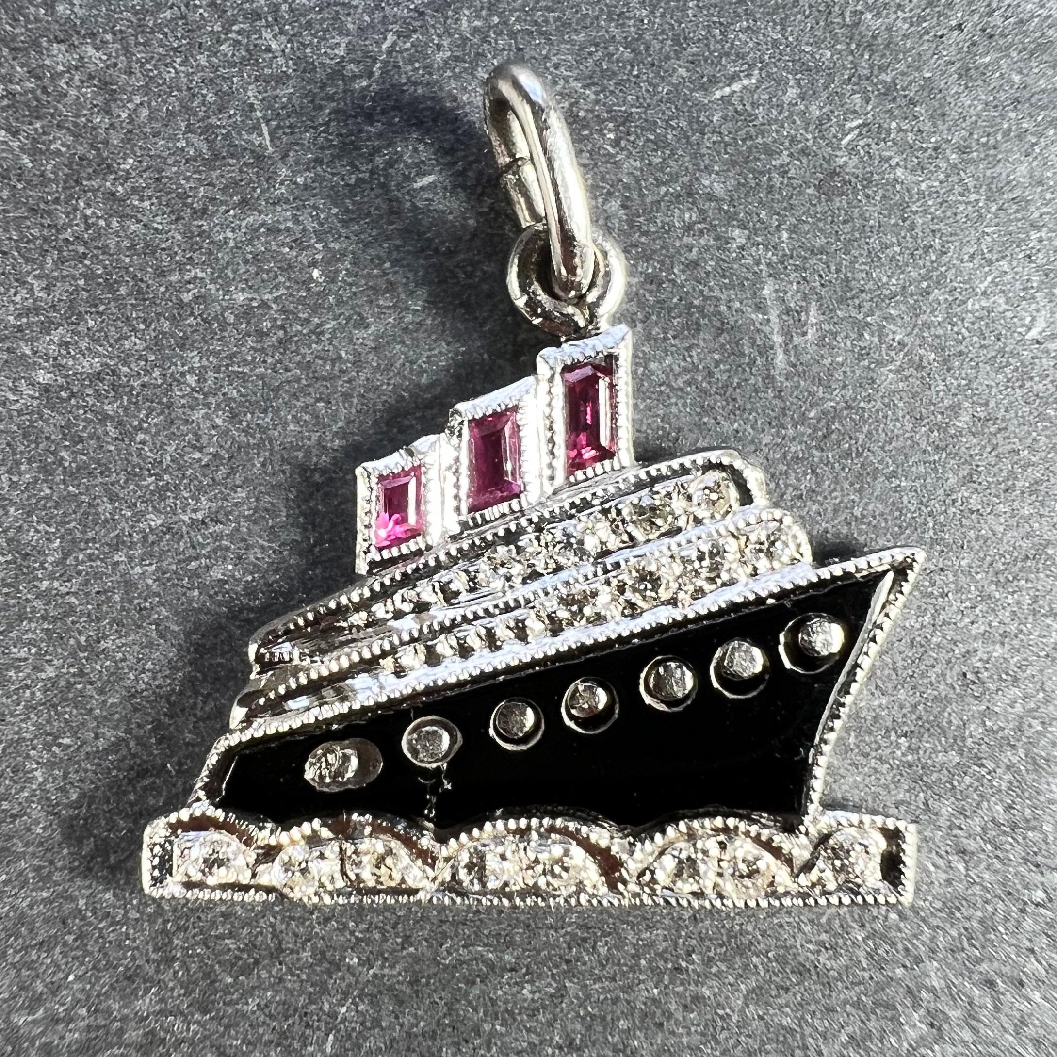 An Art Deco platinum charm pendant designed as an ocean liner boat or steamship. Set with 16 round brilliant-cut diamonds, three fancy-cut rubies and an onyx tablet cut to the shape of the ship's hull. Unmarked but tested as platinum.

Gemstone