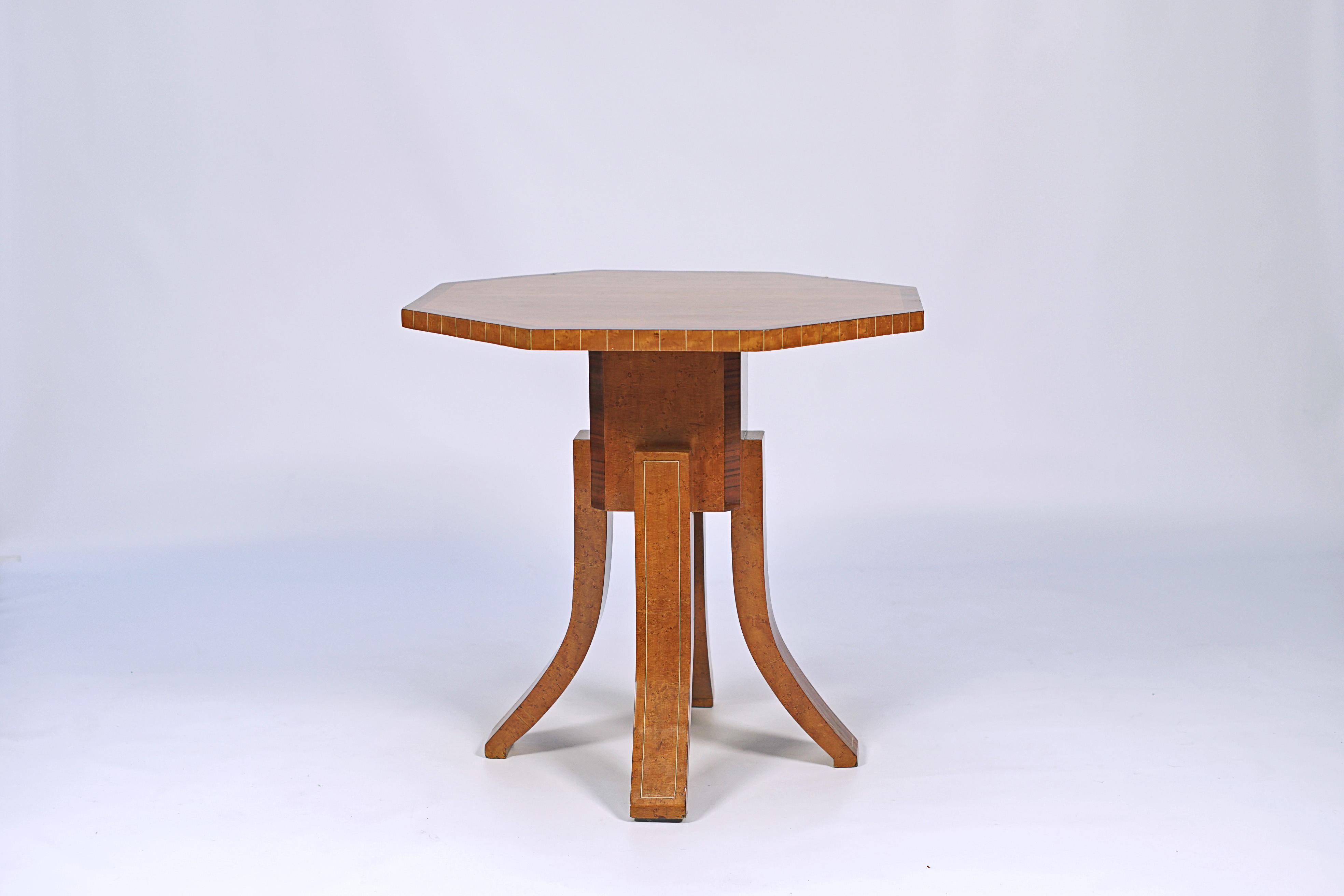 Octogonal table designed by Michel Dufet (1888-1985). Birch wood veneer and inlays.

France, CIRCA 1930.