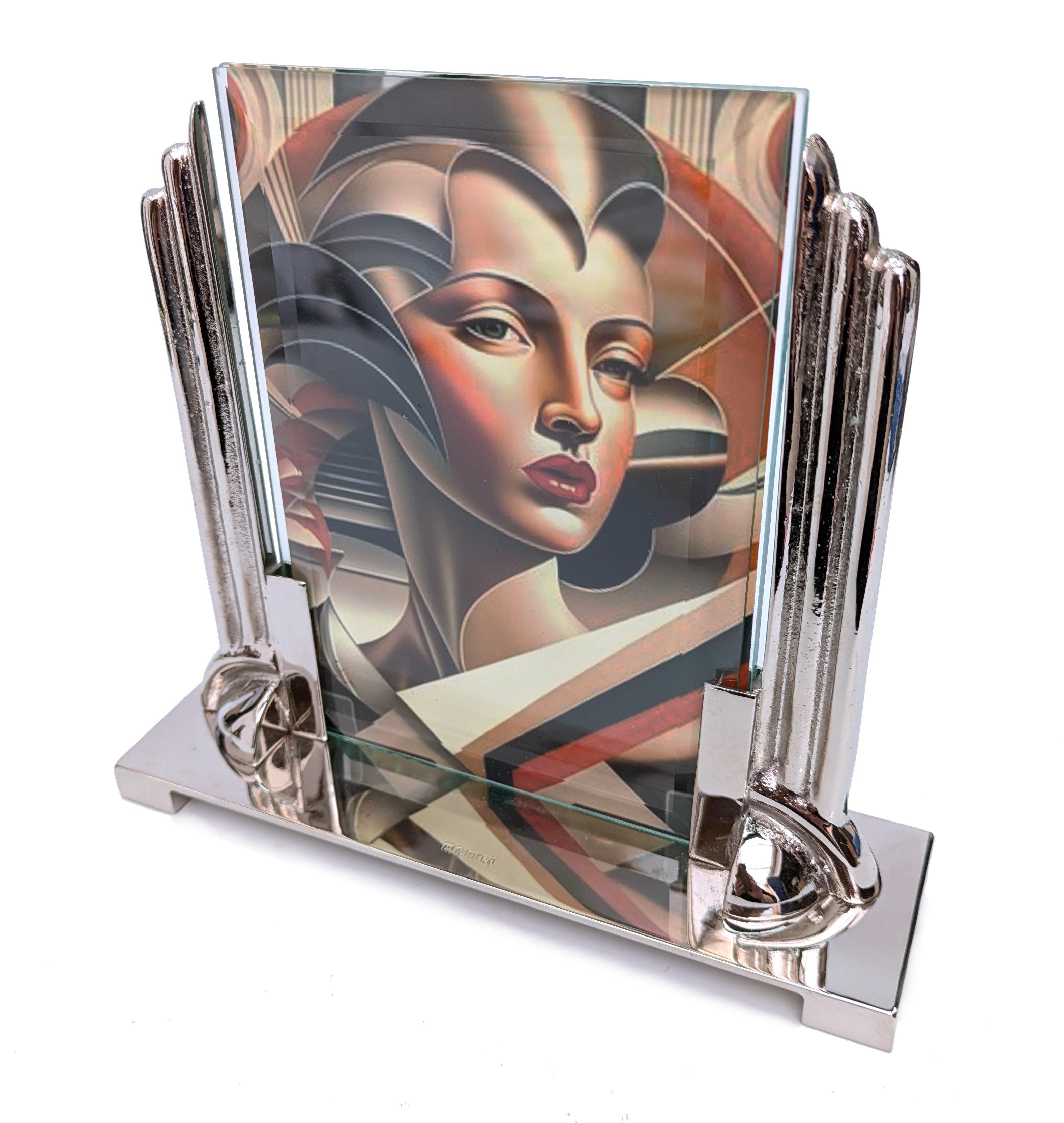 Super stylish 1930's Art Deco Modernist picture frame in hall marked nickel plated silver and glass. The frame has two pieces of bevelled glass which slot into the side stand which allows an image to be displayed both sides of the free standing
