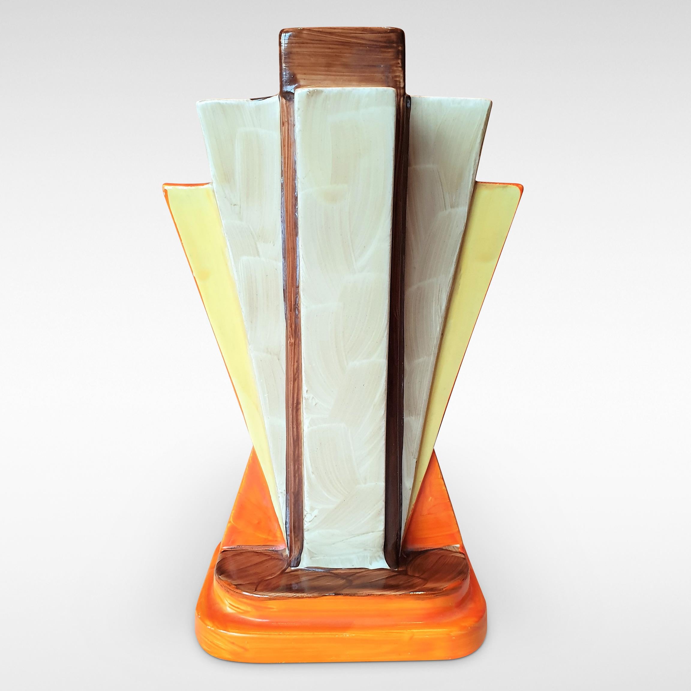 The Jazz age 'Odeon' style Art Deco 'Moderne' vase was launched by Myott Son & Co for Christmas 1933. It is sometimes known as the Pyramid Fan Vase.